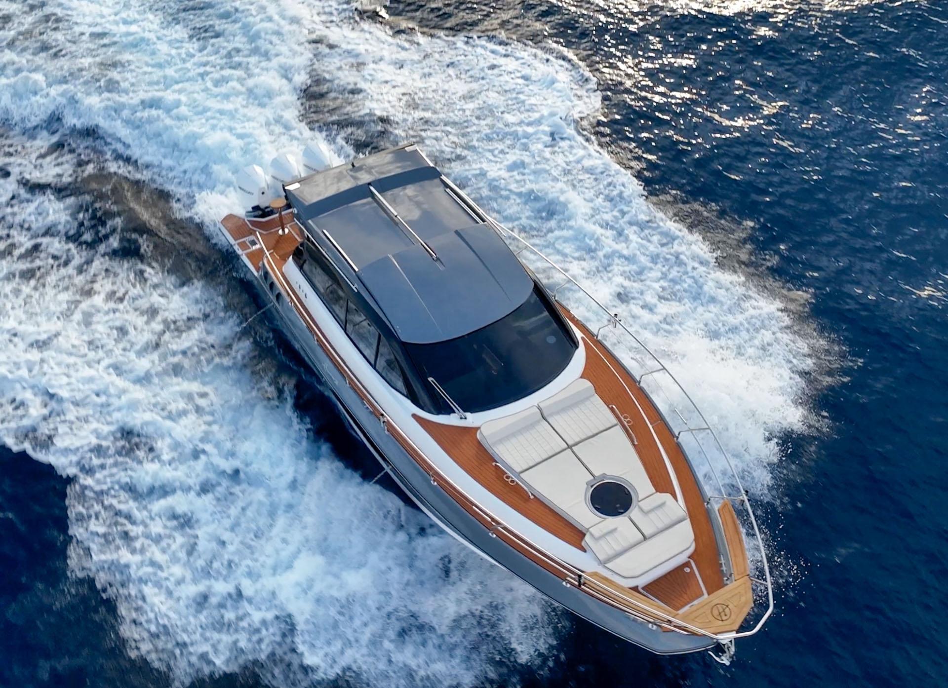 Hanover-415 2024-Music FL-US-2024 Hanover 415 yacht cruising on open water, aerial view.-9751409 | Thumbnail