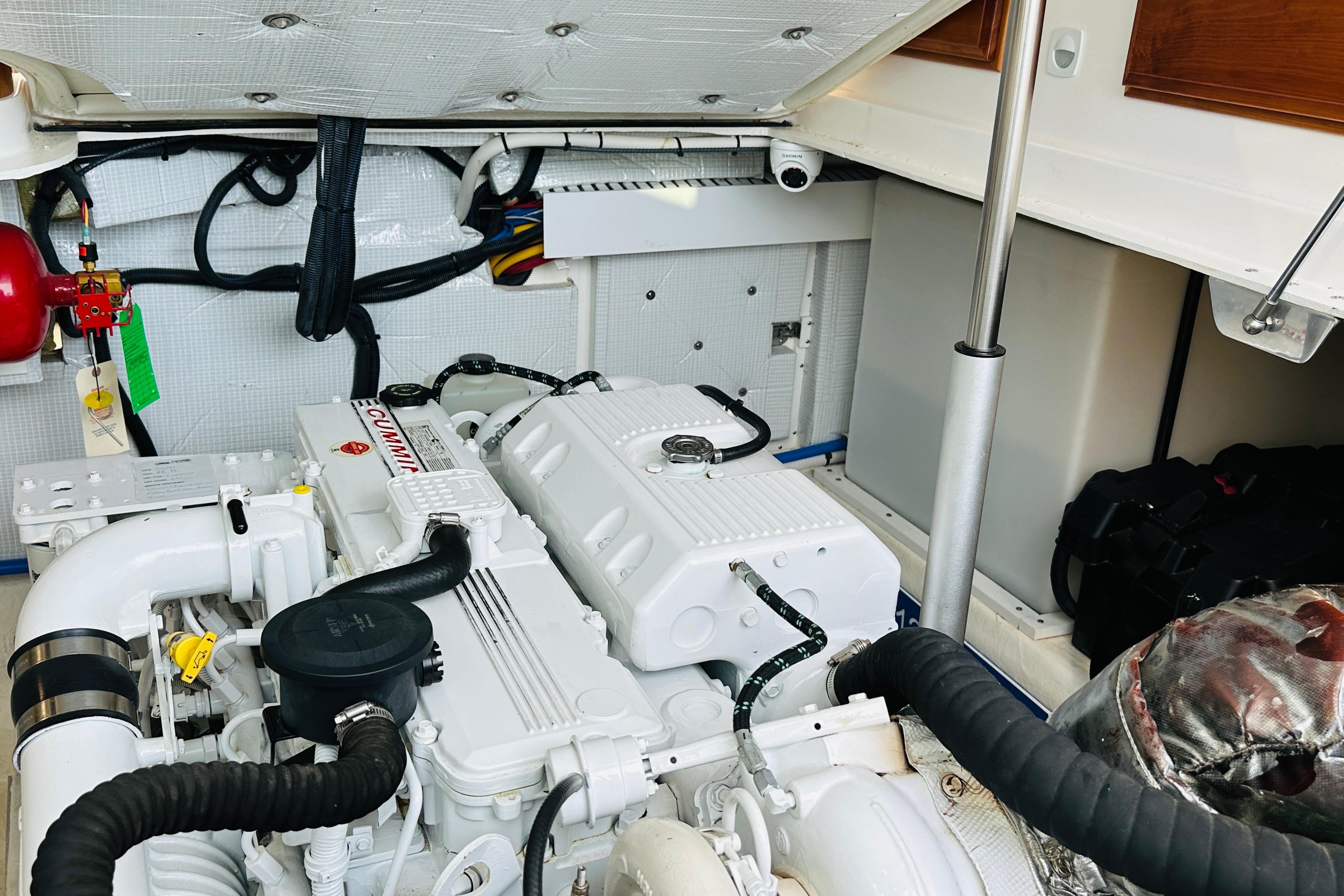 Engine room of a 2020 Back Cove 37 boat featuring a Cummins engine.