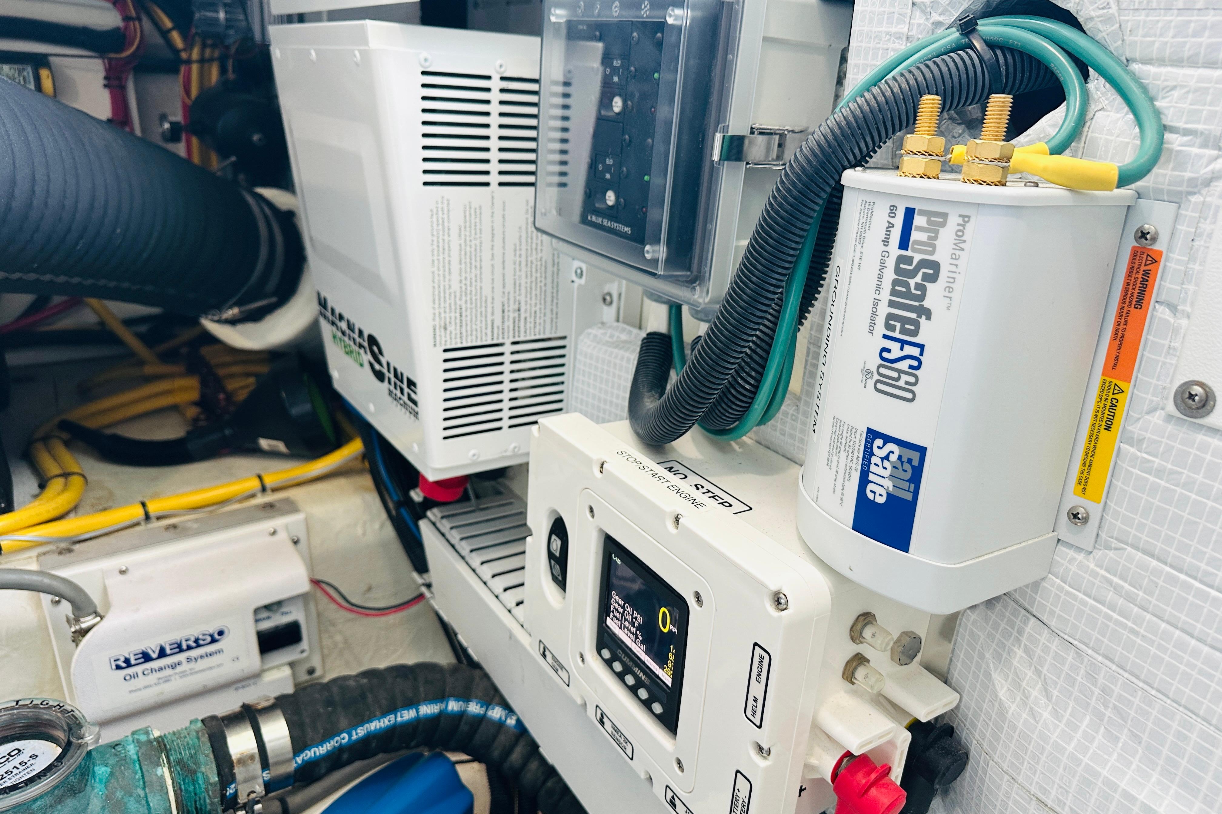 Engine room of 2020 Back Cove 37 with electrical components and wiring.