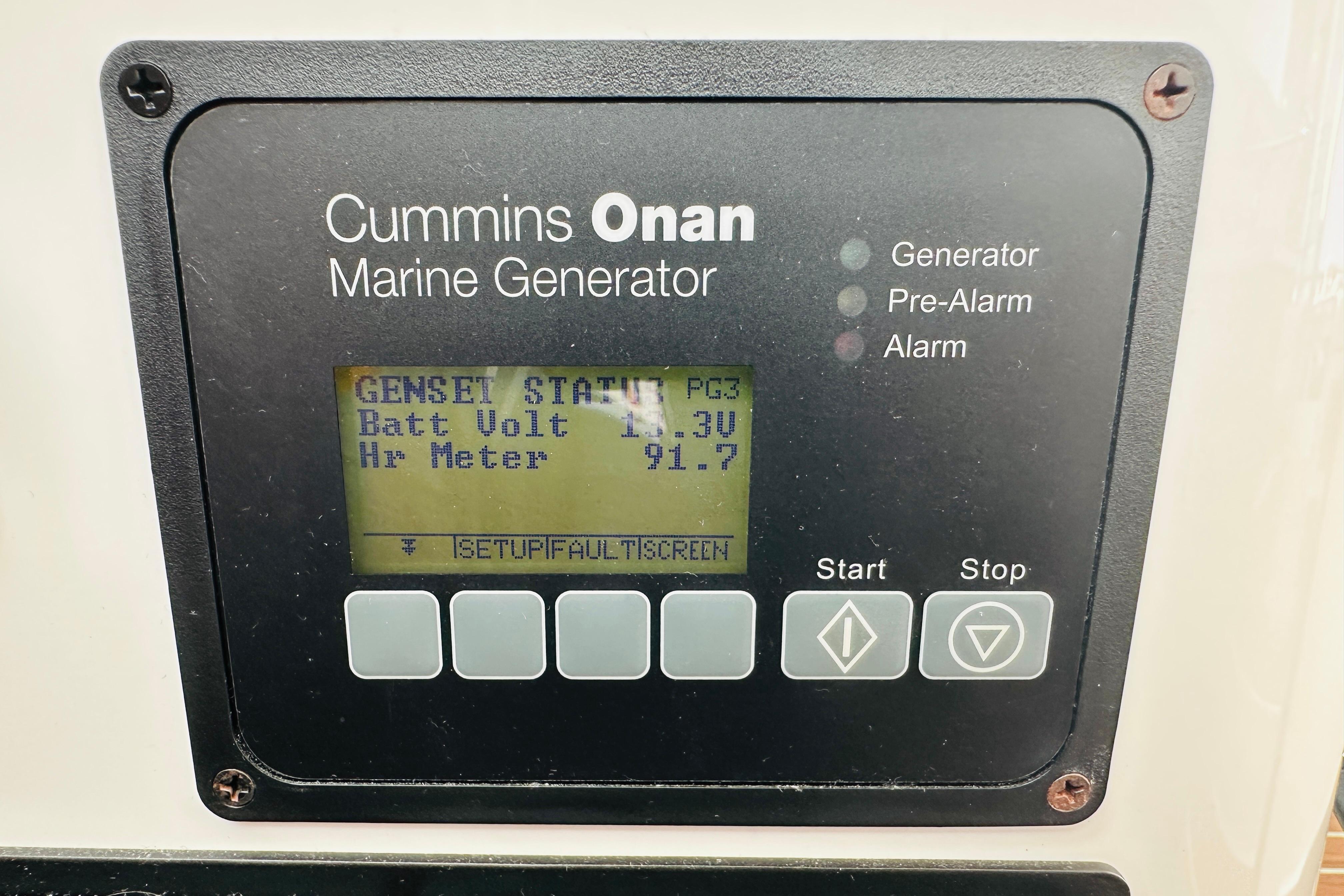 Cummins Onan marine generator display on 2020 Back Cove 37 boat, showing battery voltage and hour meter.