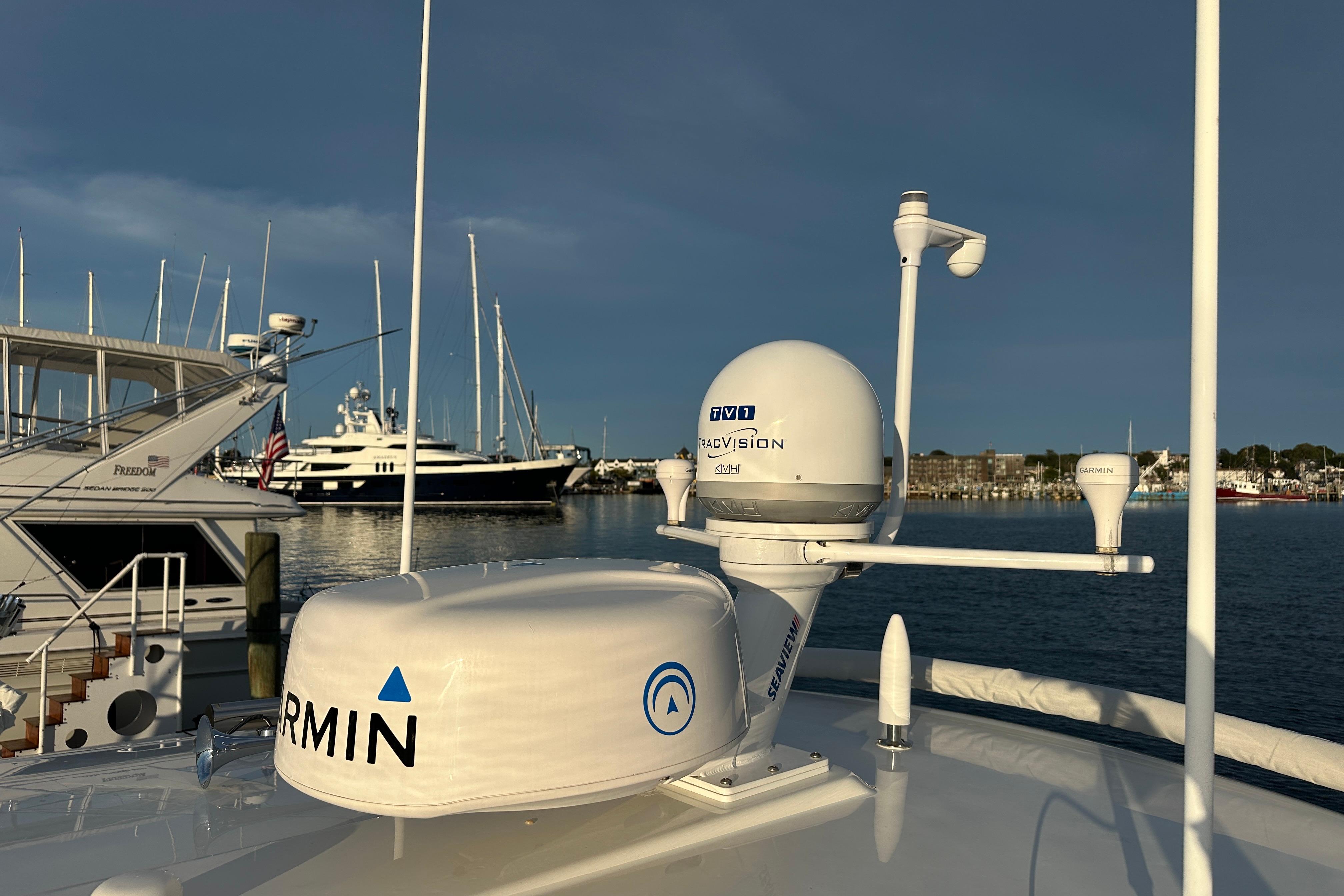 Back Cove 37 yacht (2020) with Garmin and TracVision equipment in a marina setting.