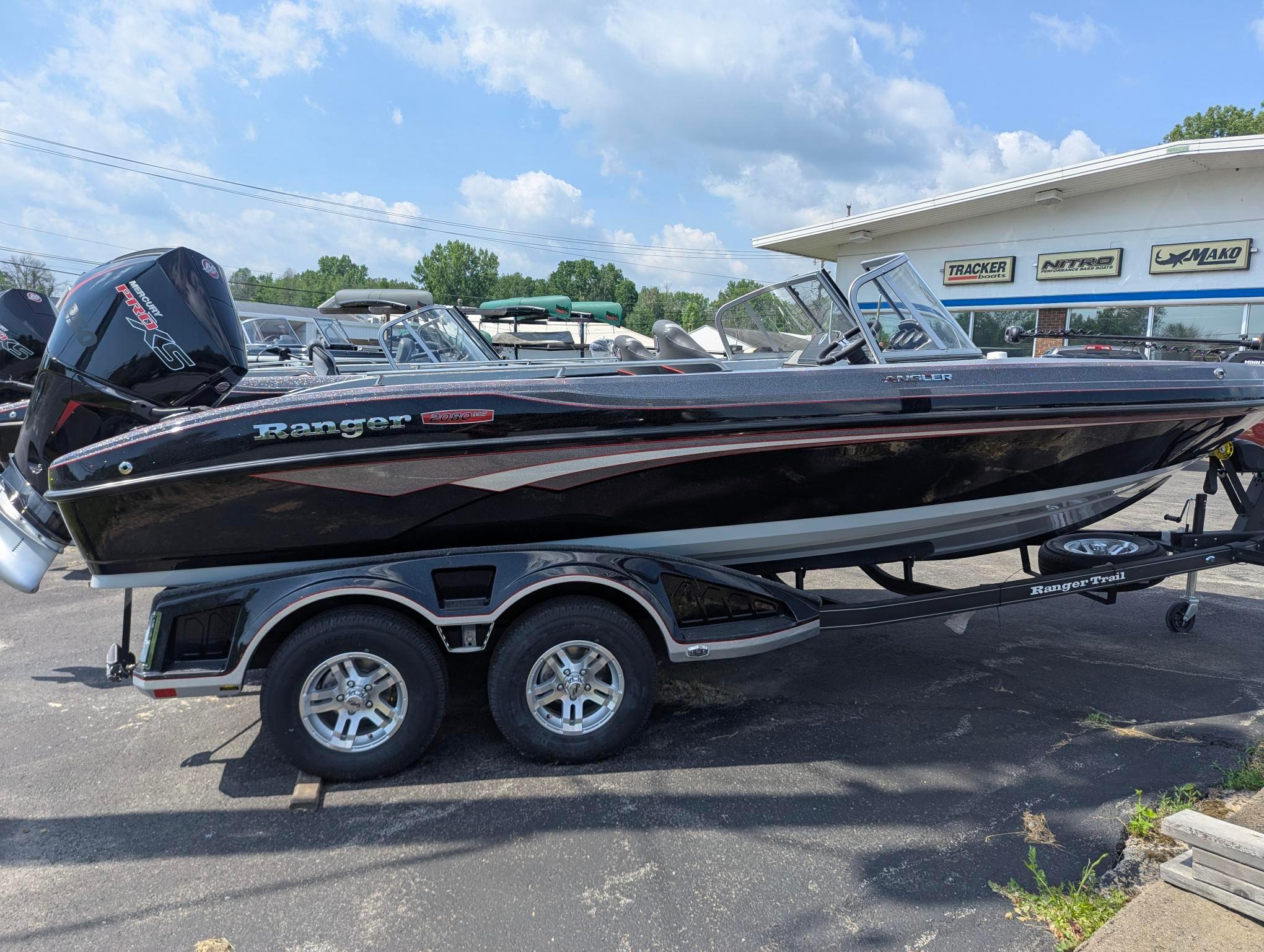 2025 Ranger 2080MS boat on trailer, parked outdoors under a clear sky.