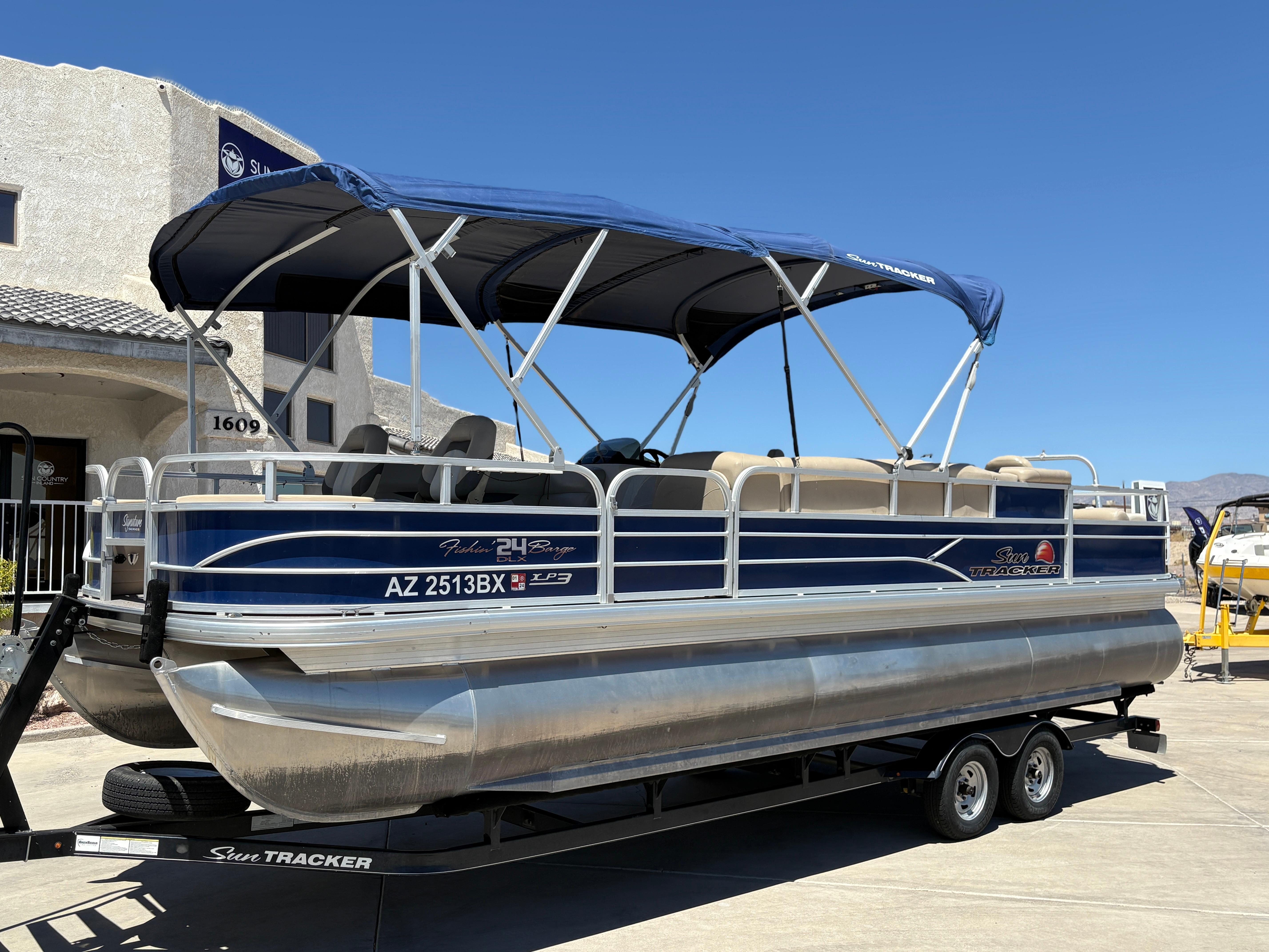 2016 Sun Tracker Fishin' Barge 24 DLX #TRW4541 inventory image at Sun Country Marine Group, Lake Havasu City, AZ 2016 Sun Tracker Fishin' Barge 24 DLX #TRW4541 inventory image at Sun Country Marine Group, Lake Havasu City, AZ
