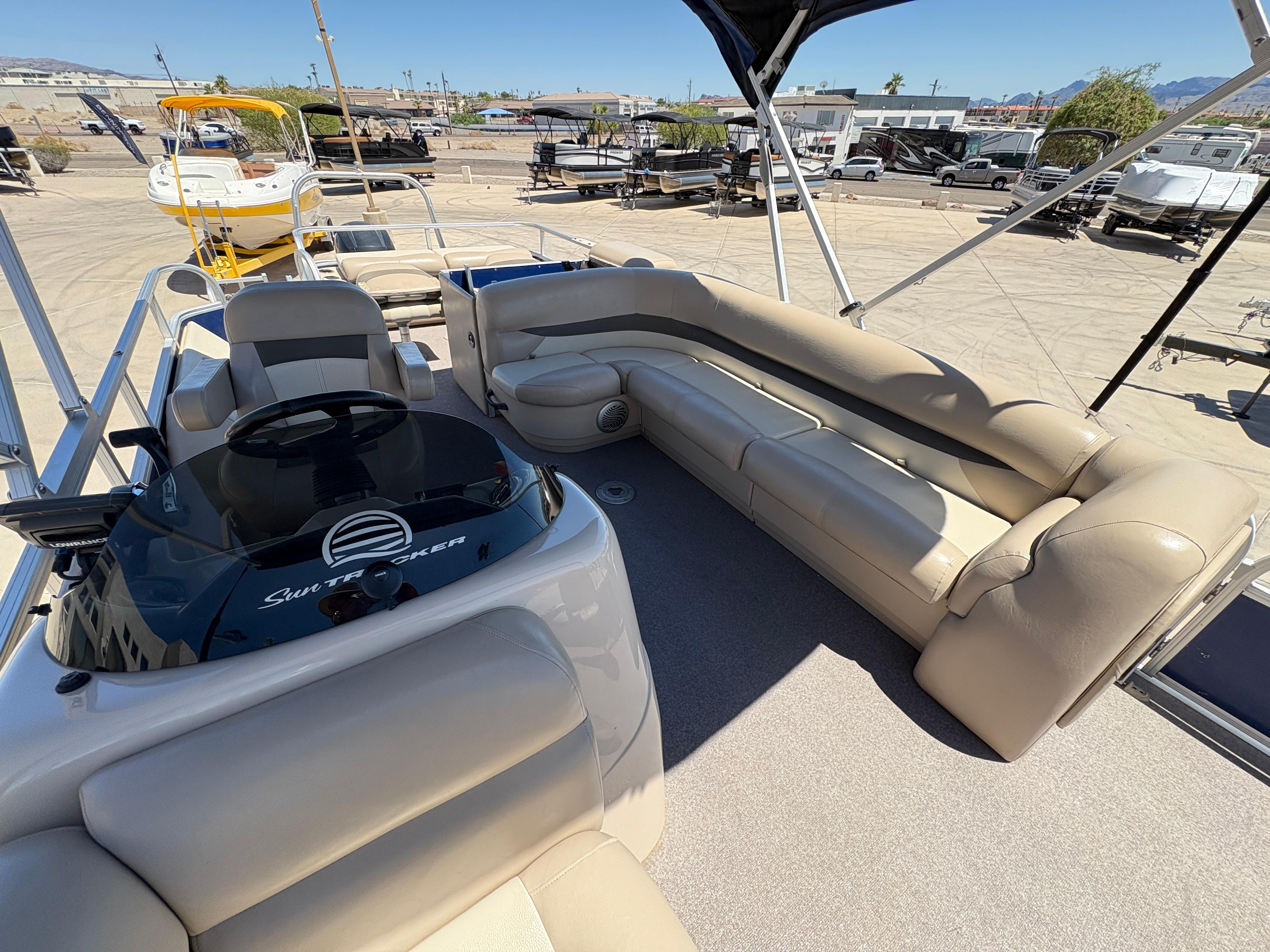 2016 Sun Tracker Fishin' Barge 24 DLX #TRW4541 inventory image at Sun Country Marine Group, Lake Havasu City, AZ 2016 Sun Tracker Fishin' Barge 24 DLX #TRW4541 inventory image at Sun Country Marine Group, Lake Havasu City, AZ