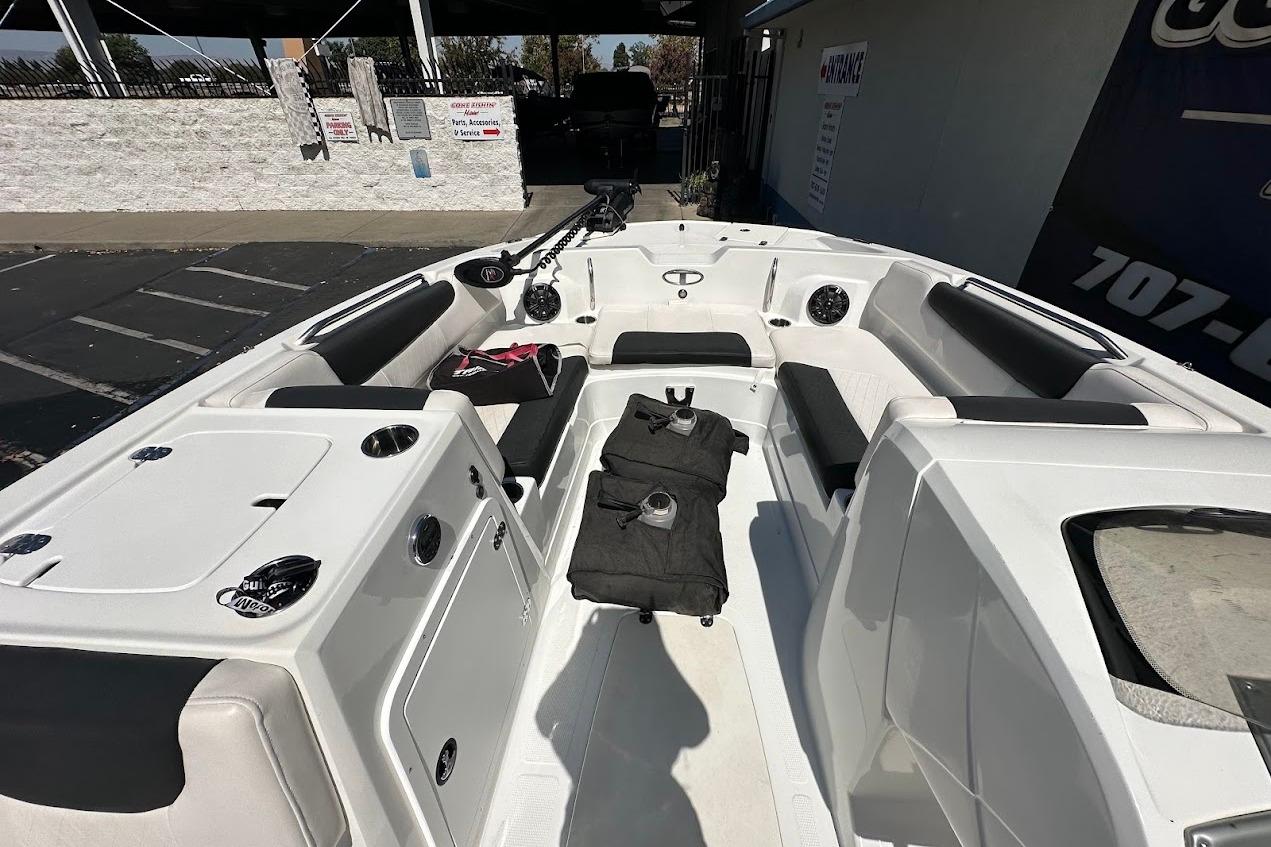 2019 Tahoe 2150 boat interior with seating and storage compartments.