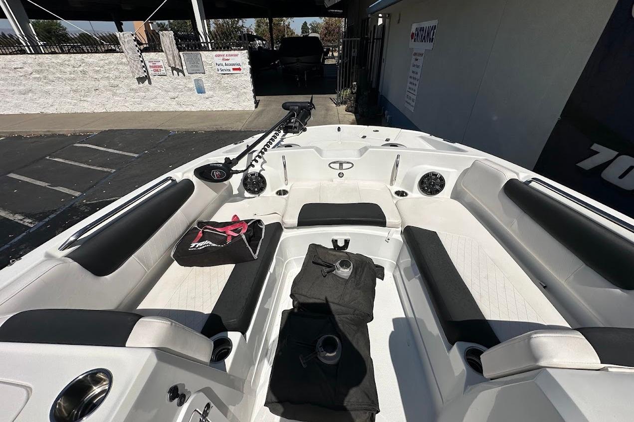 2019 Tahoe 2150 boat interior with seating, cup holders, and accessories.