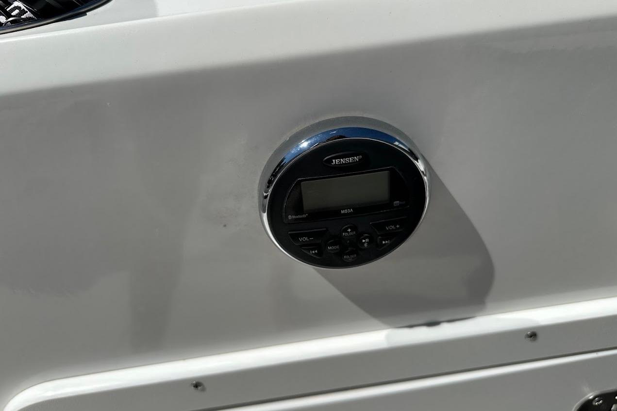 Jensen audio system on 2019 Tahoe 2150 boat dashboard.