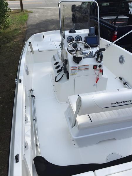 2017 Bayliner Element F18 CC boat interior with steering console and seating.