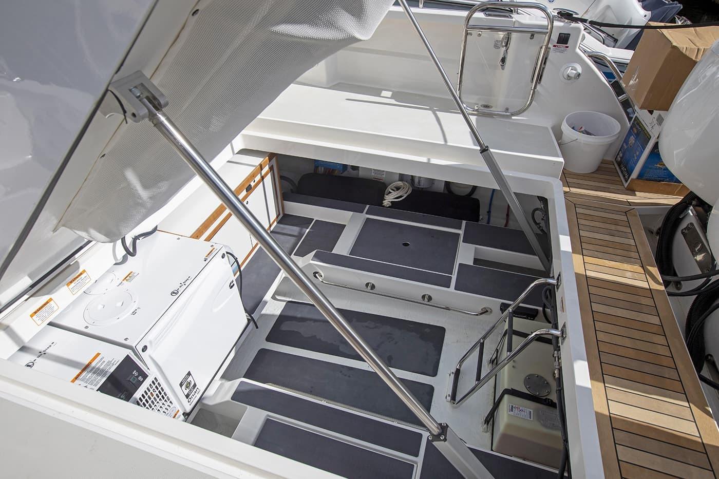 2027 Back Cove 39O yacht engine compartment with open hatch and visible equipment.