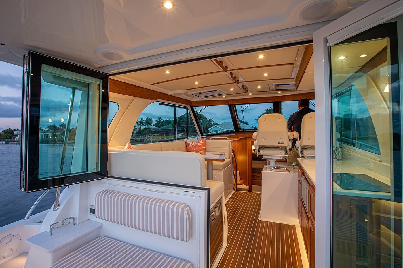 Luxurious interior of 2027 Back Cove 39O yacht with elegant seating and modern design.