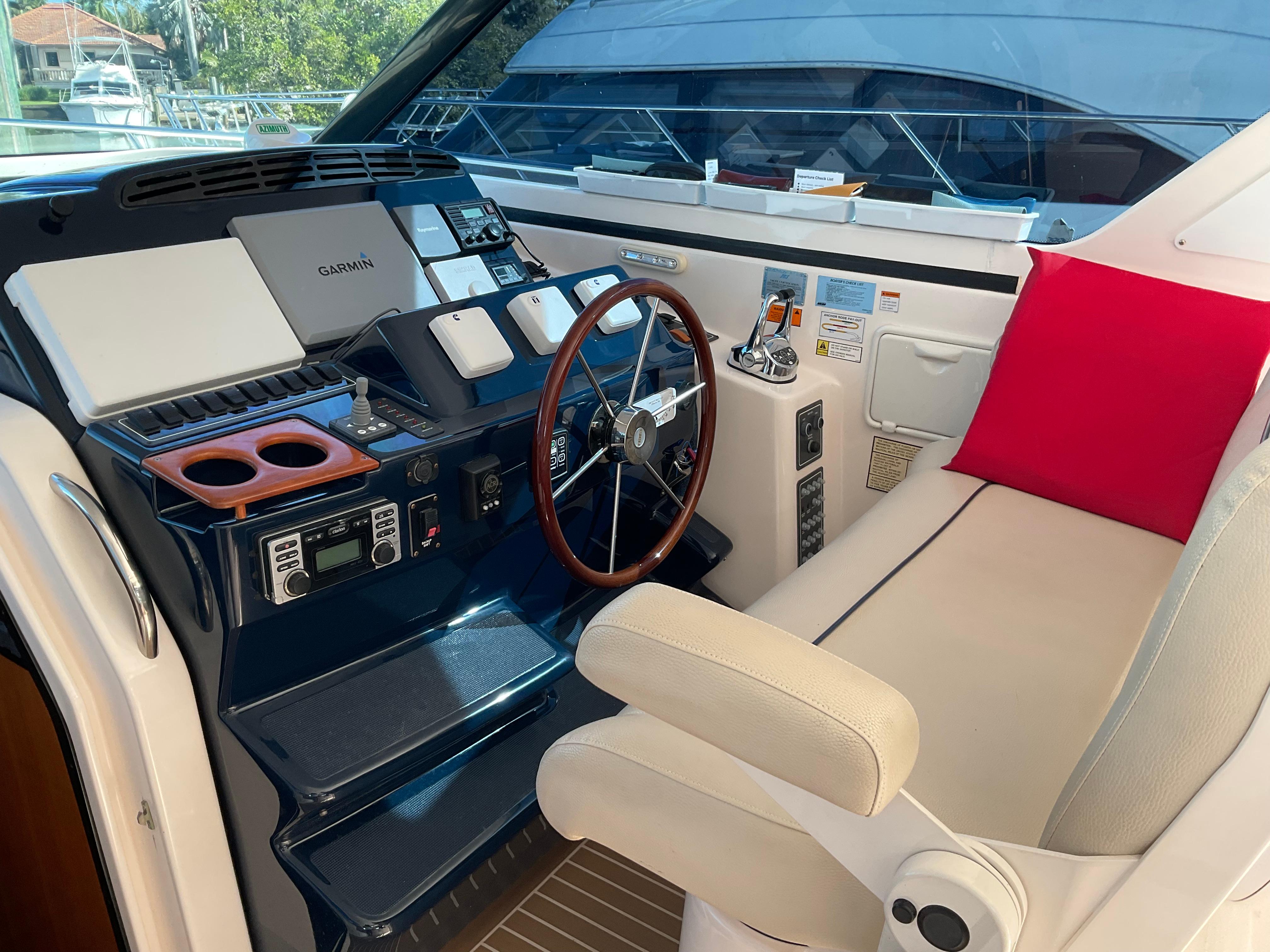 Tiara Yachts-4400 Sovran 2004-CC Rider FL-US-2004 Tiara Yachts 4400 Sovran helm with steering wheel and navigation controls.-9631623