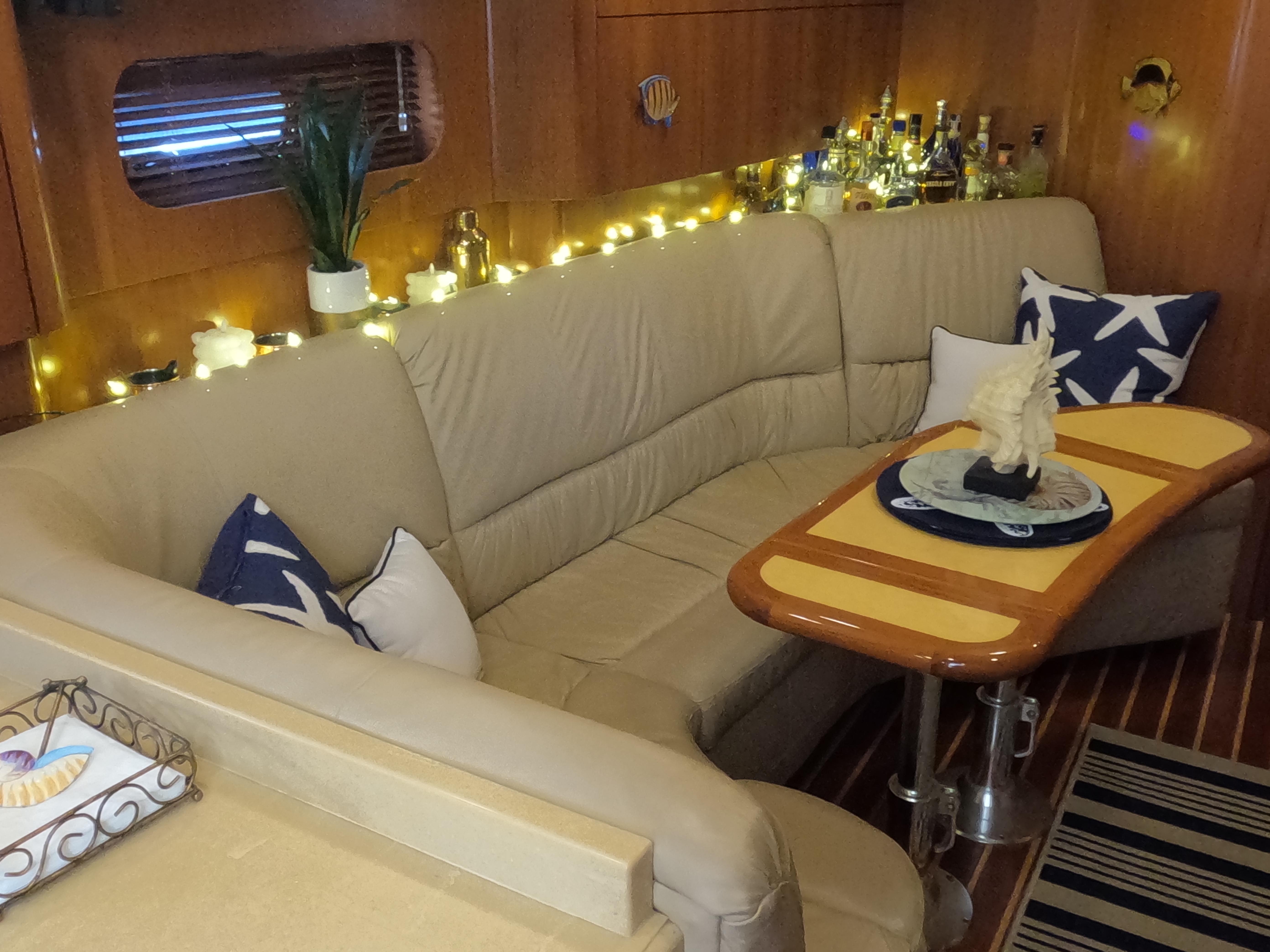 Tiara Yachts-4400 Sovran 2004-CC Rider FL-US-Luxurious 2004 Tiara Yachts 4400 Sovran interior with cozy seating and elegant decor.-9631623 | Thumbnail