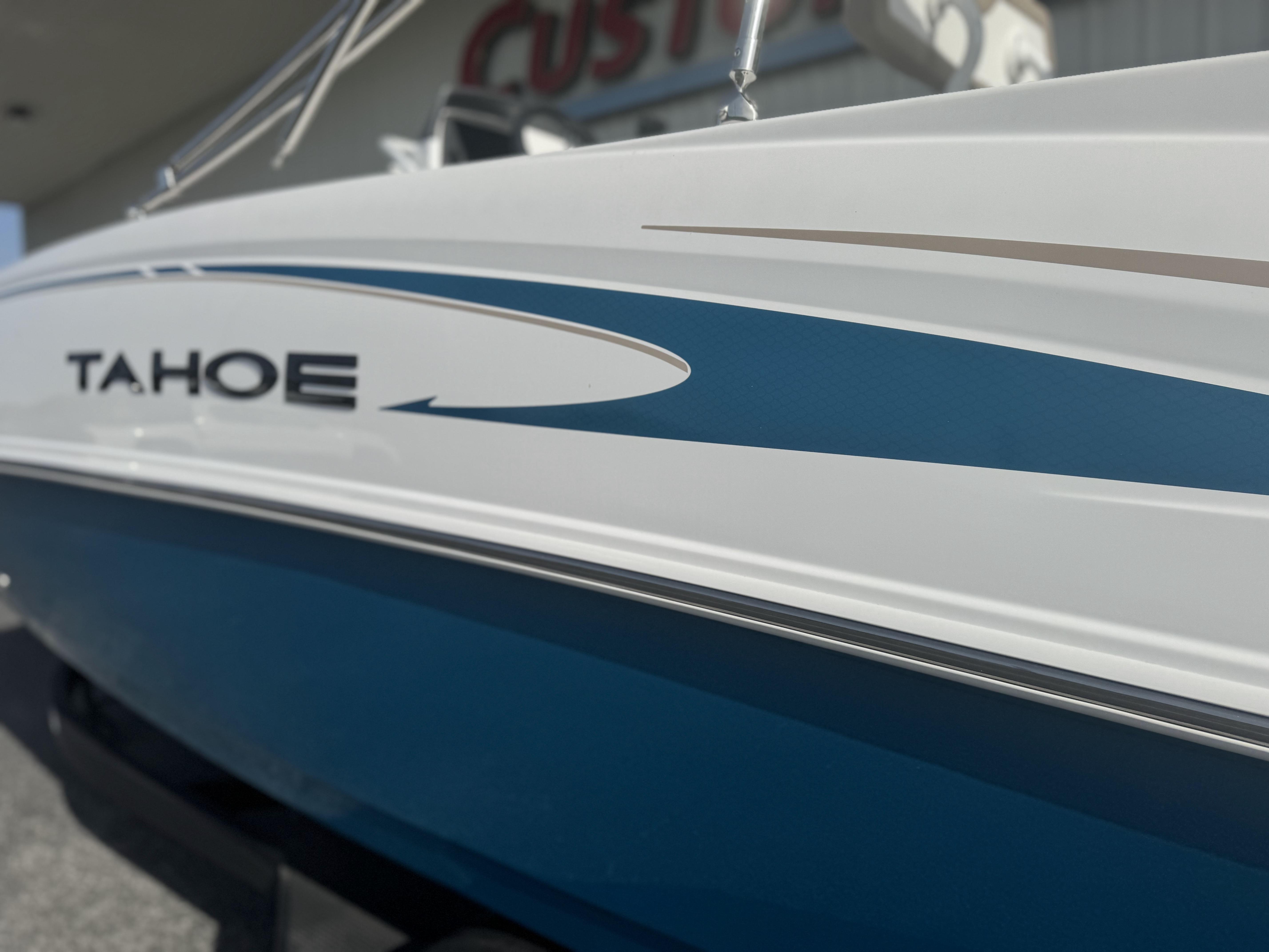 2025 Tahoe 2150 CC boat with sleek blue and white design.