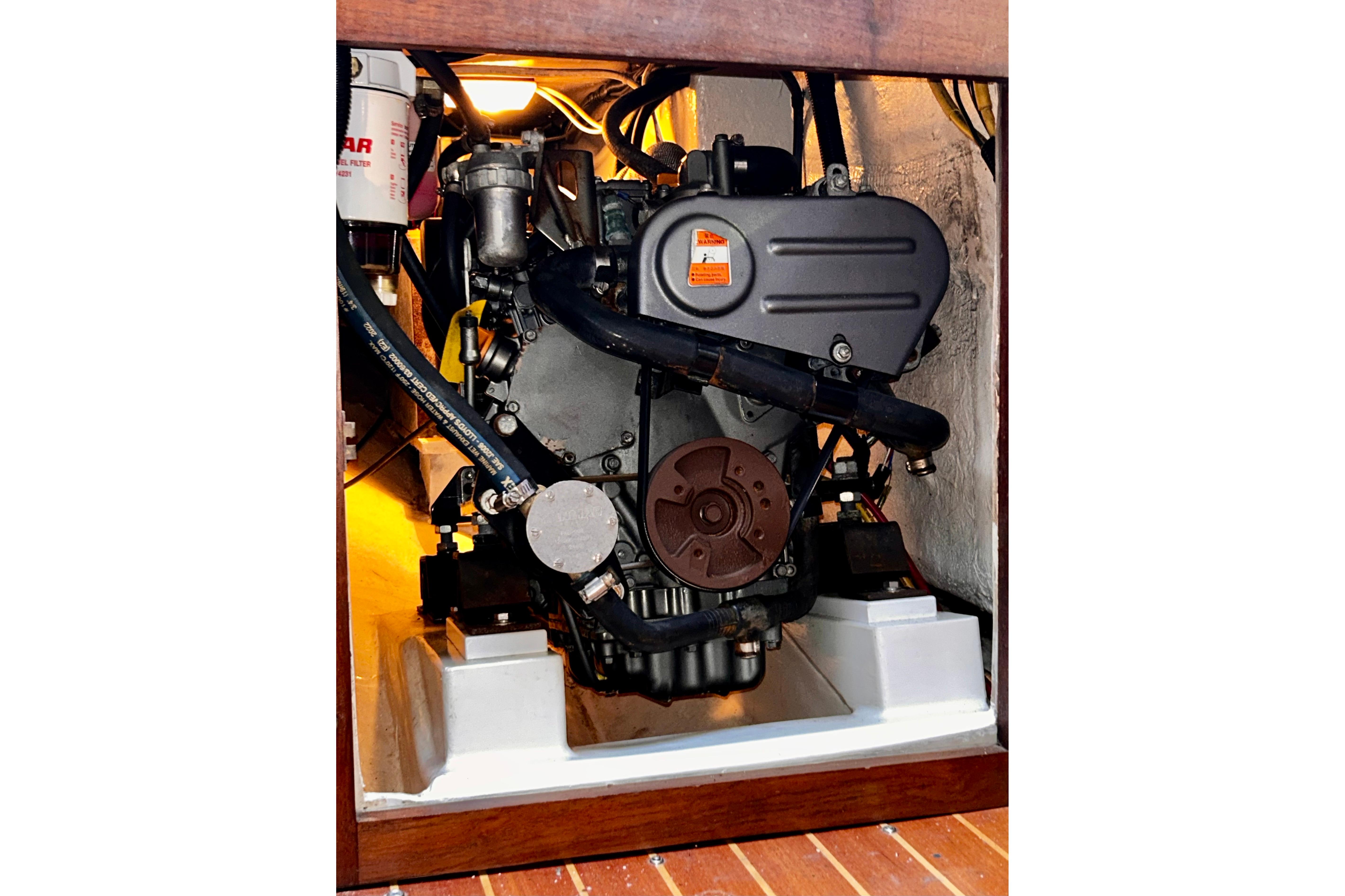 Engine compartment opening into cabin with 2018 Yanmar 3YM30 w/330 hrs.