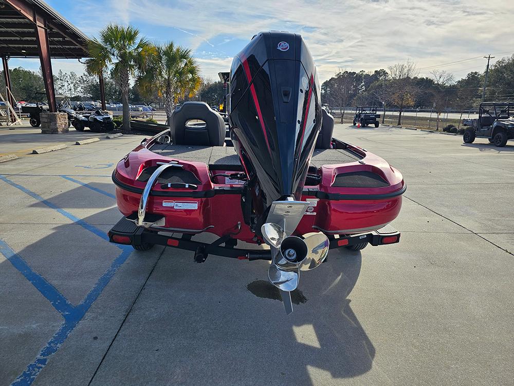2025 Nitro Z18 boat with powerful outboard motor, parked outdoors on a sunny day.
