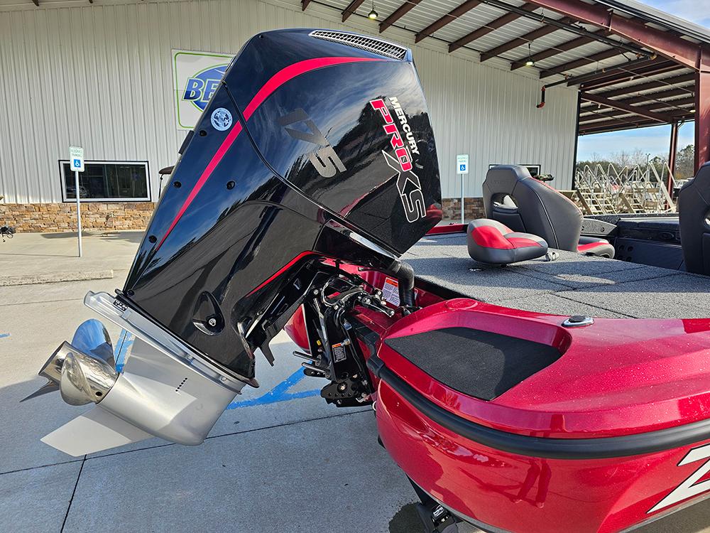 2025 Nitro Z18 boat with powerful outboard motor, parked outdoors.