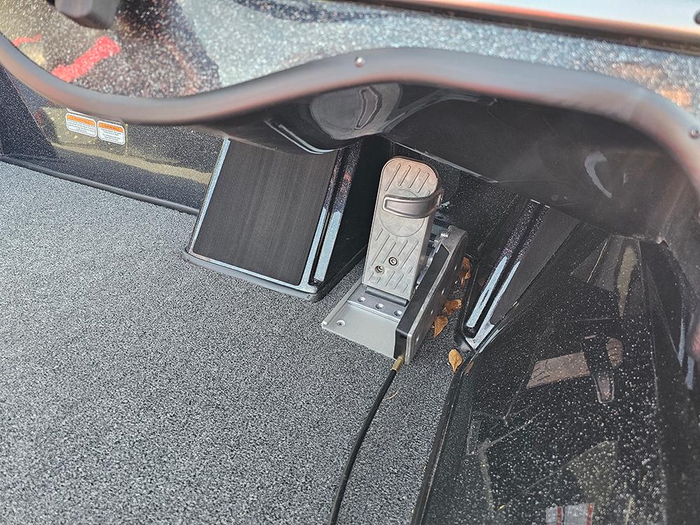 2025 Nitro Z18 boat foot pedal and control panel in cockpit area.