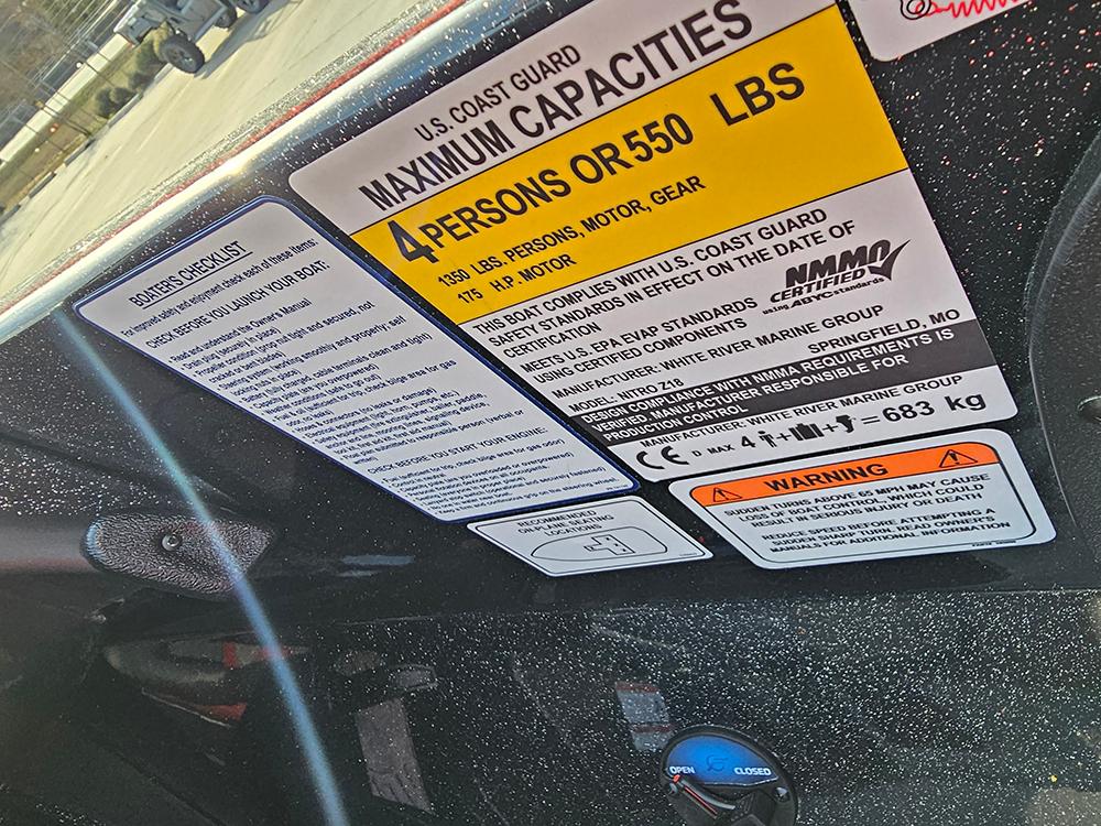 U.S. Coast Guard capacity label on Nitro Z18, 2025 model, showing limits and safety warnings.