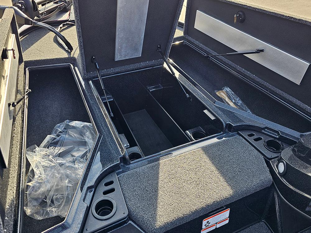 Open storage compartments in a 2025 Nitro Z18 boat, showcasing spacious interior design.