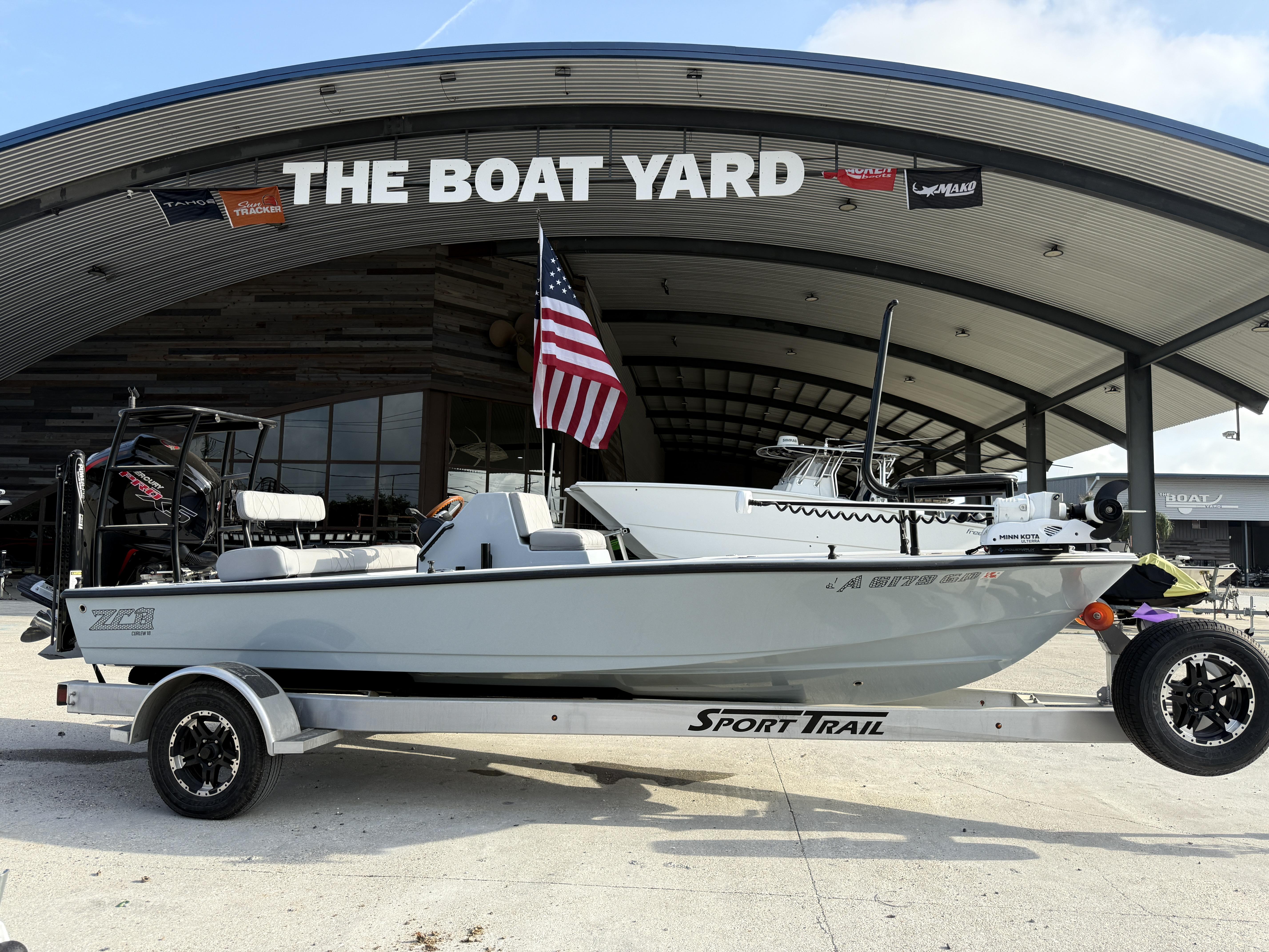 2023 ZCB 18 Curlew boat on trailer at The Boat Yard dealership.