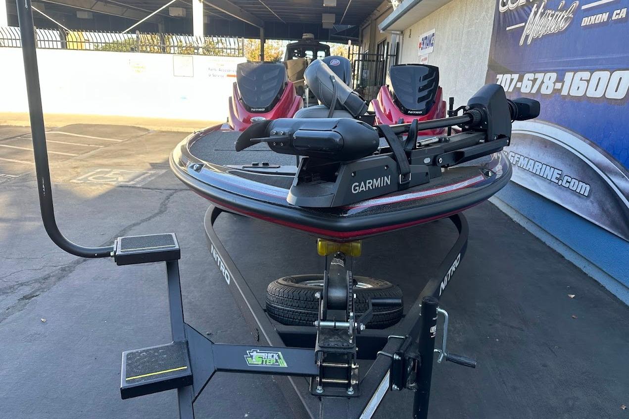 2024 Nitro Z17 boat with Garmin equipment on trailer in parking lot.