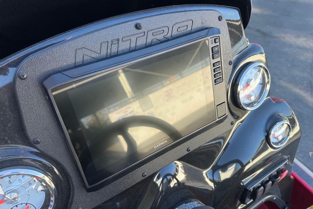 Dashboard of 2024 Nitro Z17 boat featuring Garmin display and gauges.