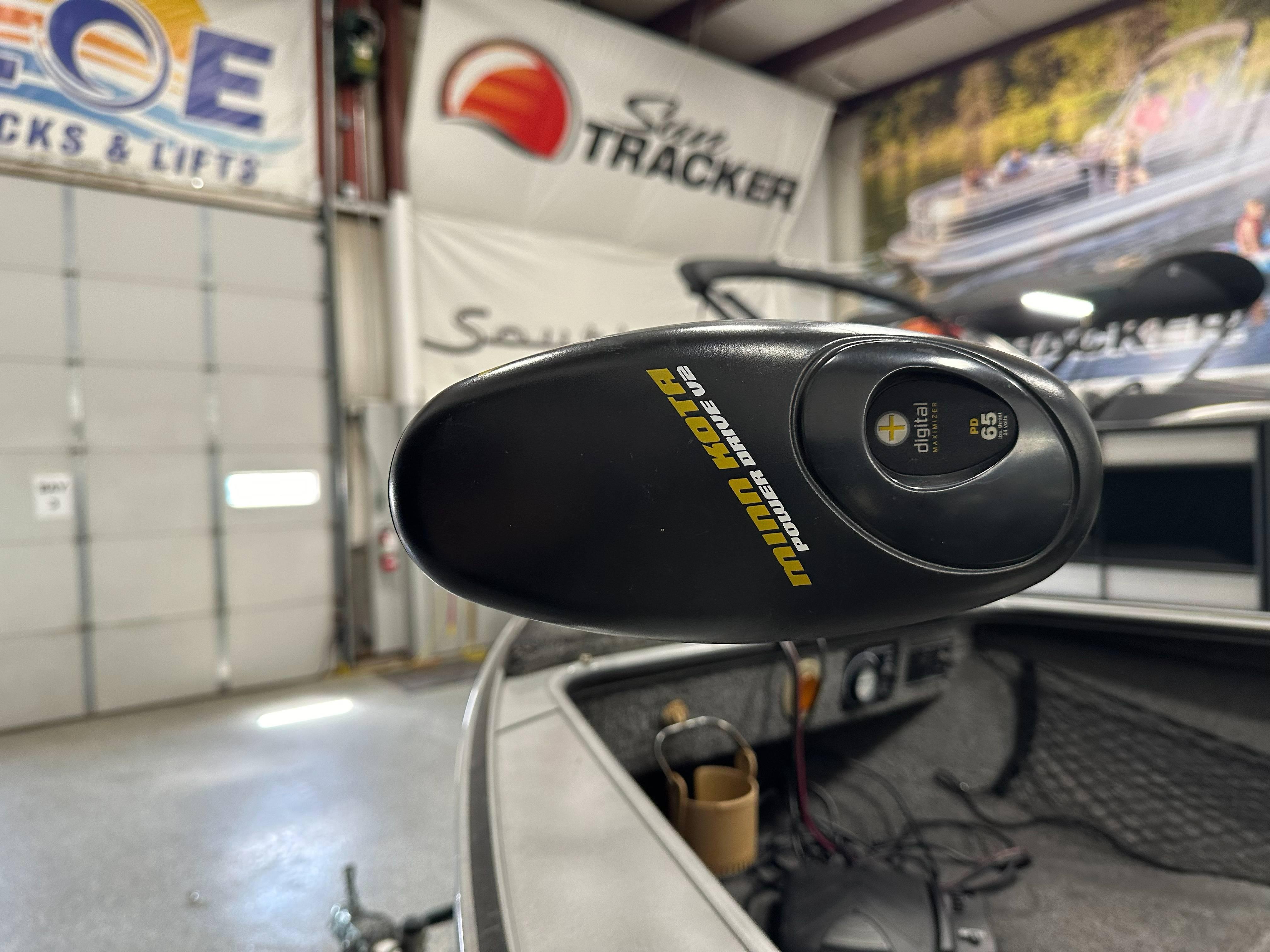 Minn Kota PowerDrive V2 trolling motor on 1995 Lund 1650 DLX boat in garage.