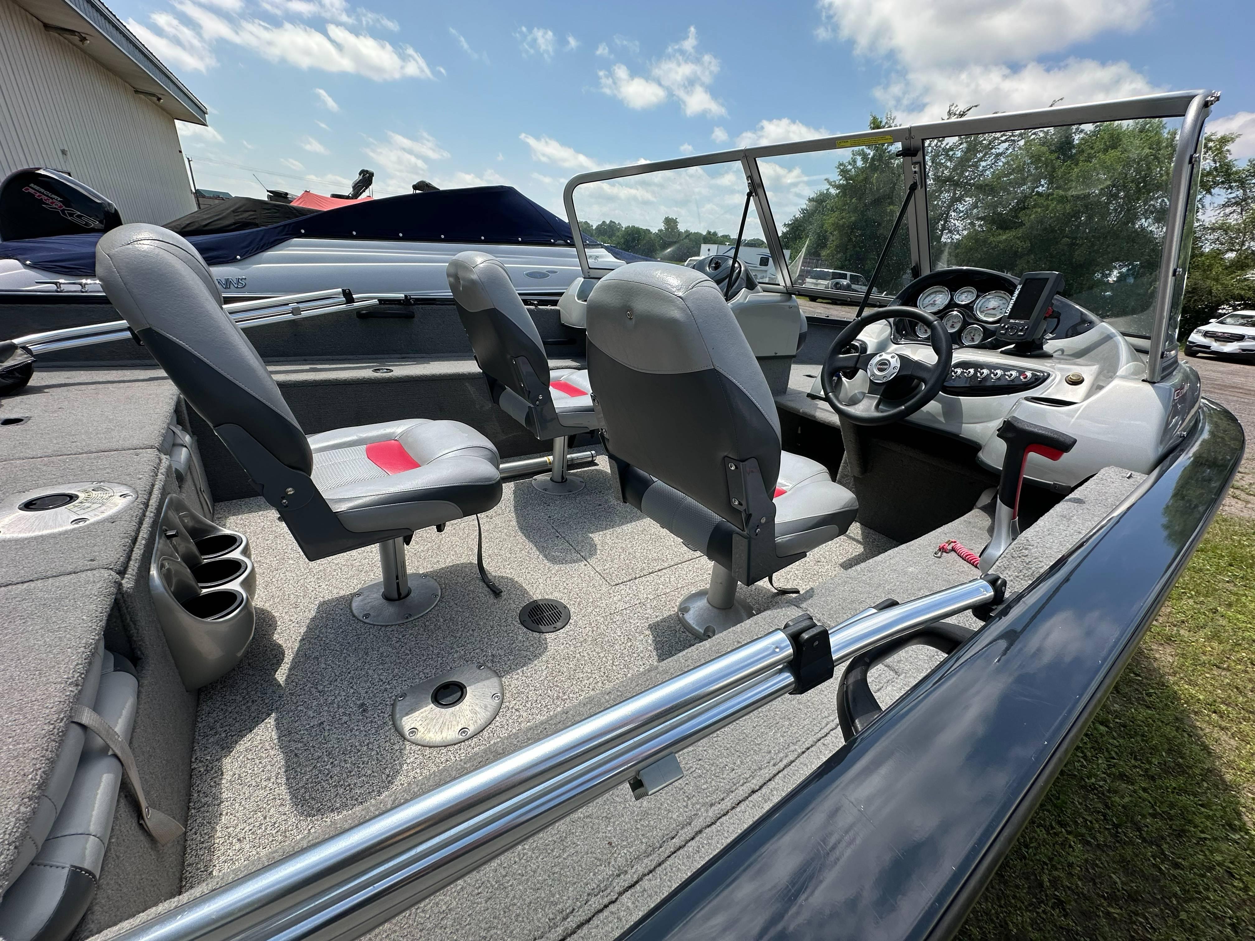 2013 Tracker Pro Guide V-175 WT boat interior with seating and control panel.