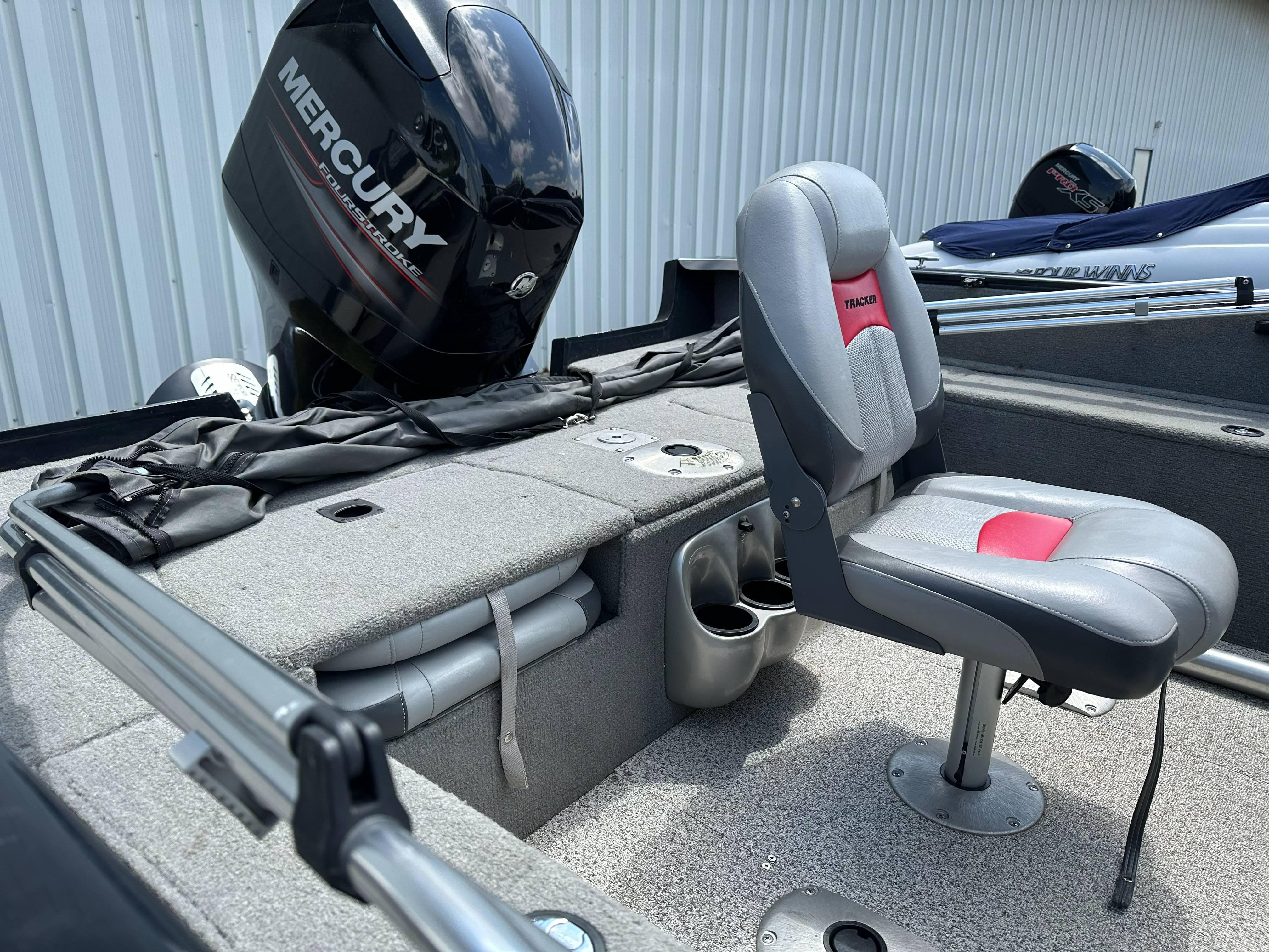 2013 Tracker Pro Guide V-175 WT boat interior with Mercury engine and seating.