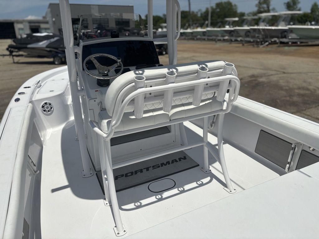 2024 Sportsman Masters 227 Bay boat interior with steering console and seating.