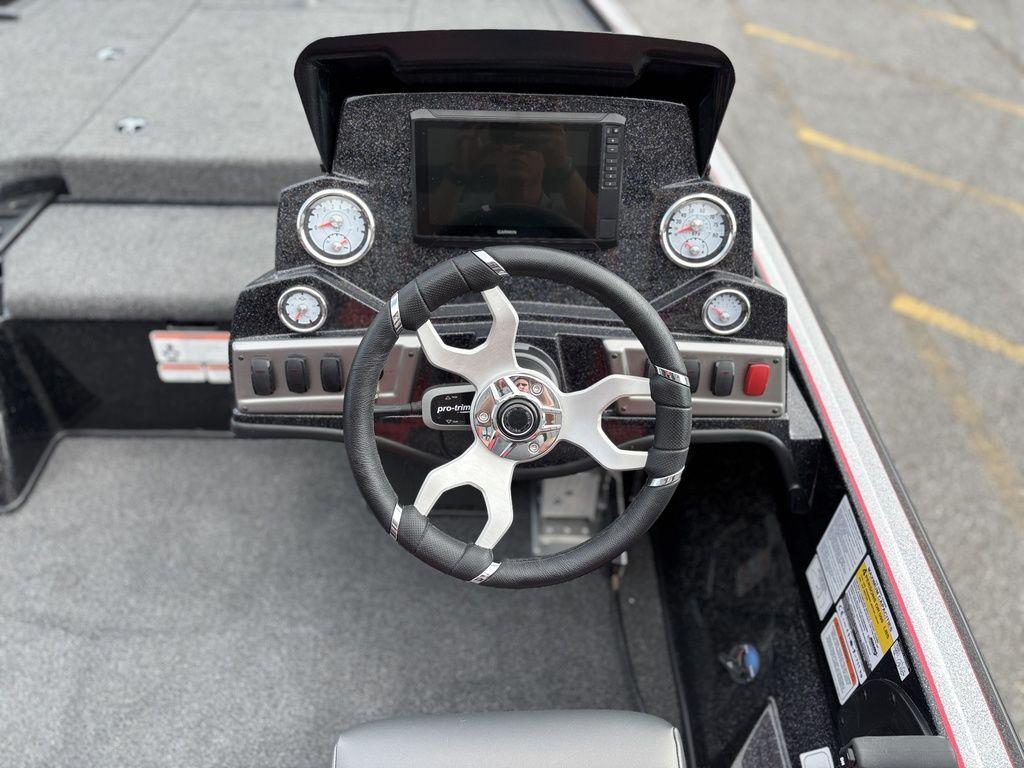 Steering console of a 2025 Nitro Z19 Pro boat with modern gauges and controls.