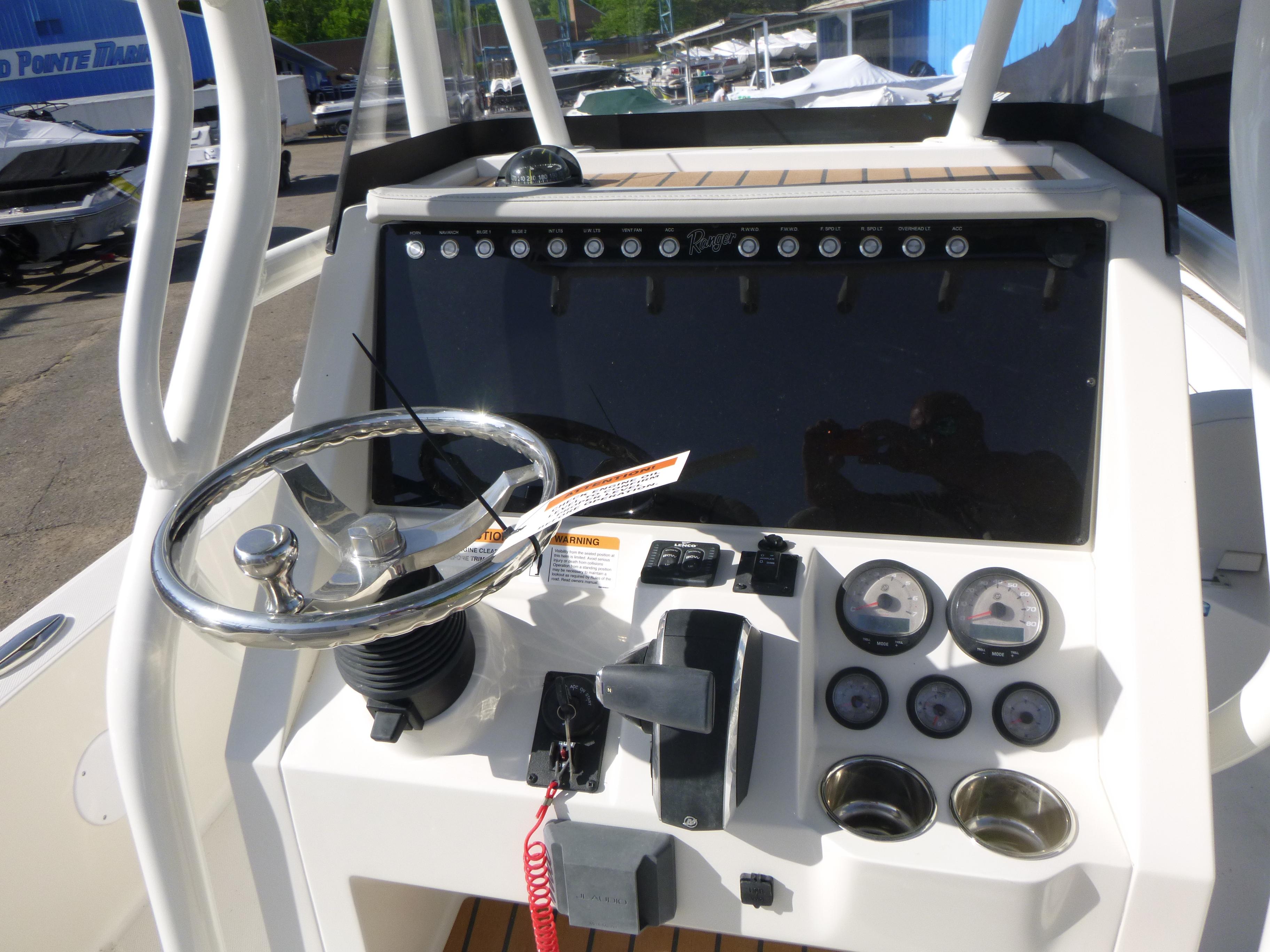 2024 Ranger 2360 Bay Ranger boat console with steering wheel and gauges.