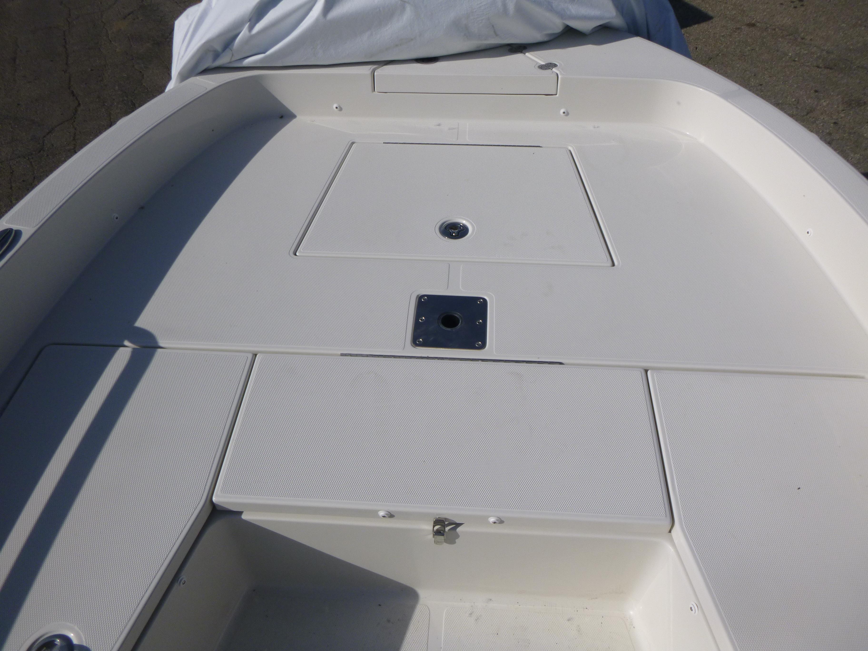 2024 Ranger 2360 Bay Ranger boat deck with storage compartments.