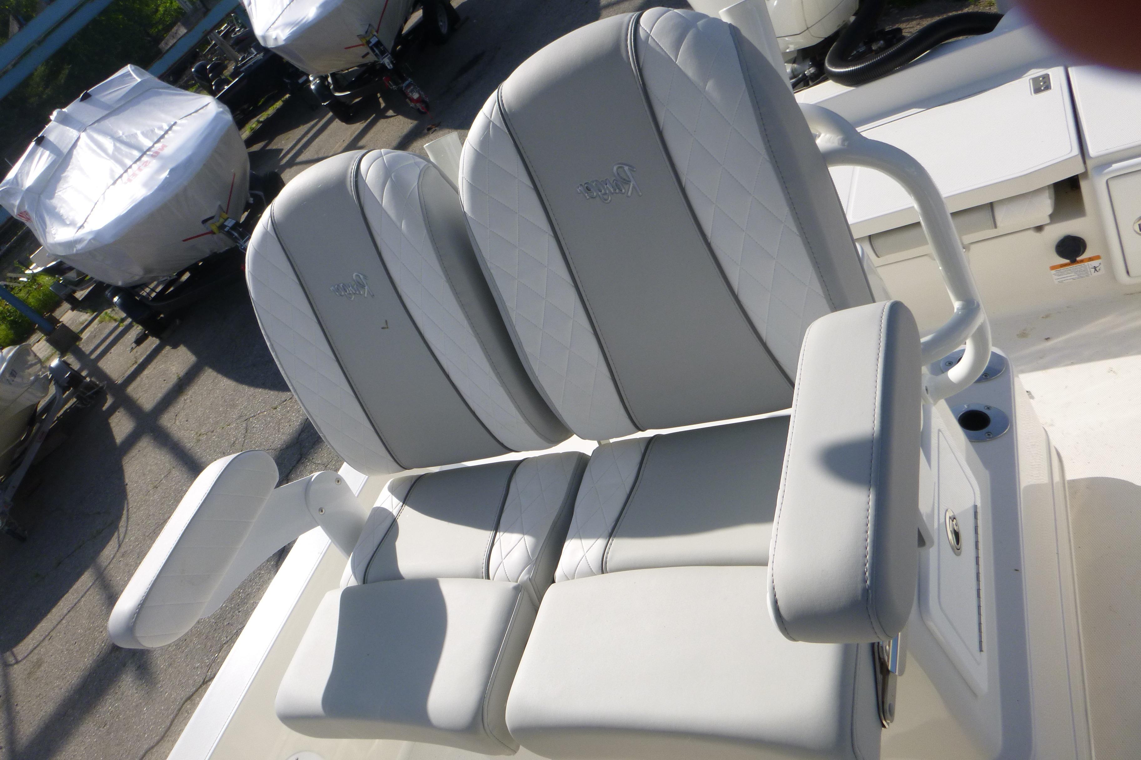2024 Ranger 2360 Bay Ranger boat seats with armrests, featuring elegant gray upholstery.