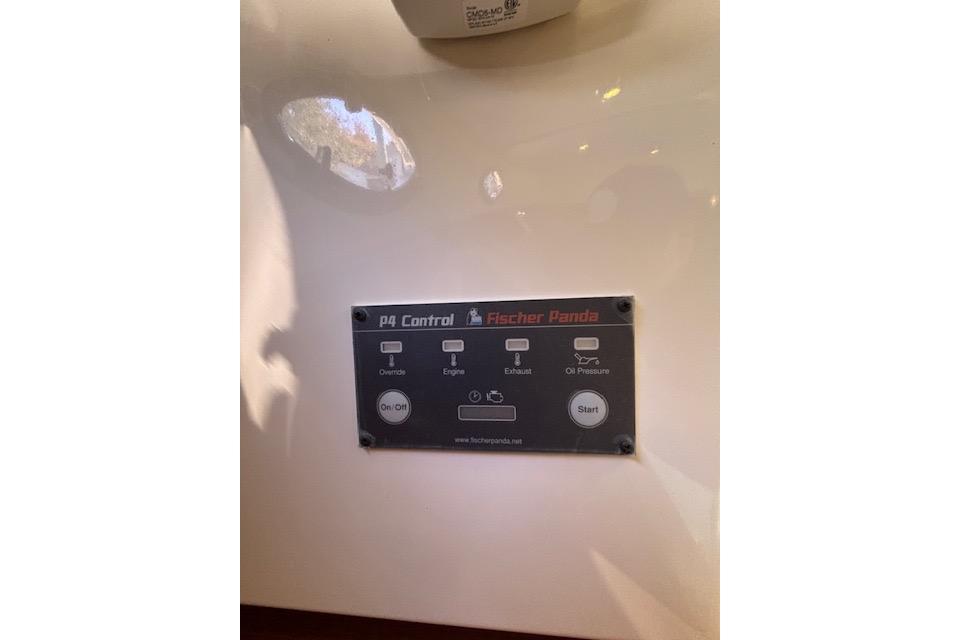 Control panel of a 2018 Back Cove 30 boat featuring Fischer Panda PQ Control.