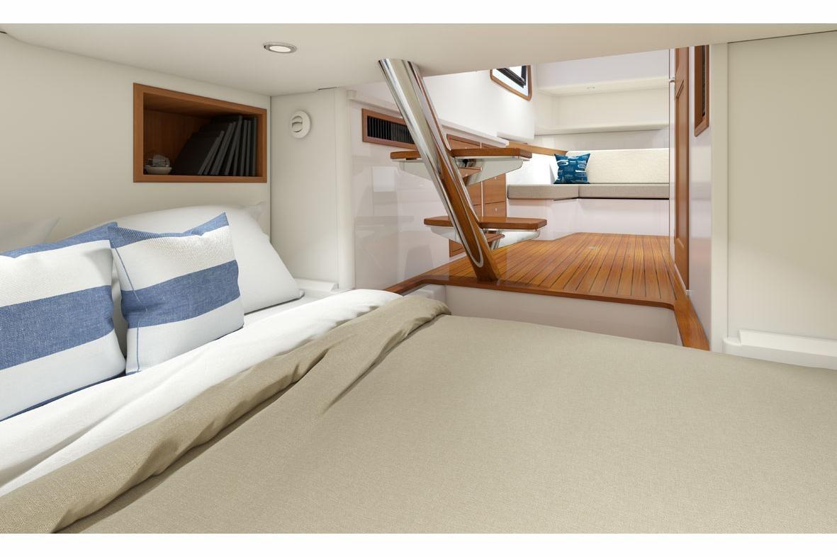 Luxurious interior of 2025 MJM 4 yacht with cozy bedding and wooden flooring.