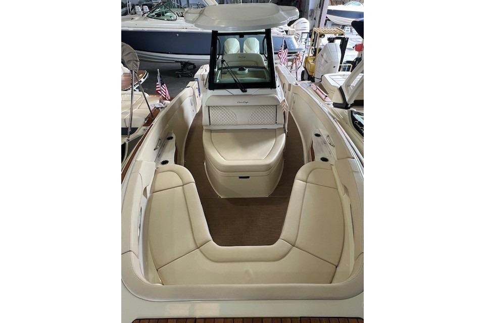 2024 Chris-Craft Catalina 28 boat interior with luxurious seating and elegant design.