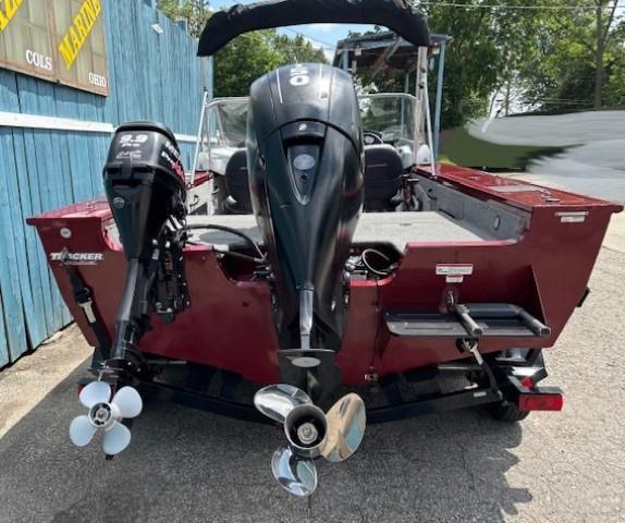2015 Tracker Targa V-18 Combo boat, rear view, dual outboard motors, red exterior.