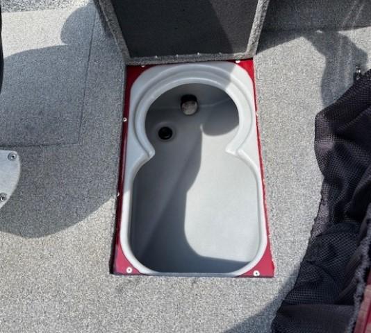2015 Tracker Targa V-18 Combo boat storage compartment with gray interior.