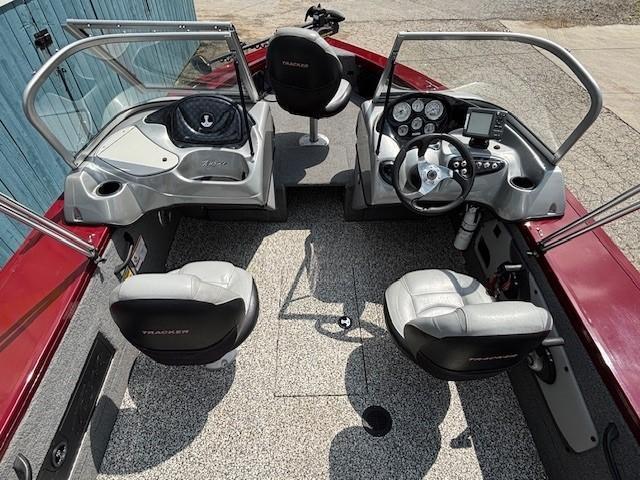 2015 Tracker Targa V-18 Combo boat interior with seating and dashboard controls.