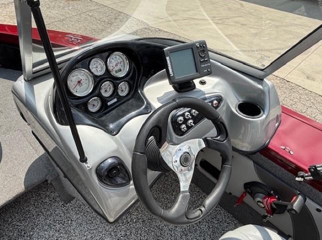 2015 Tracker Targa V-18 Combo boat dashboard with steering wheel and gauges.