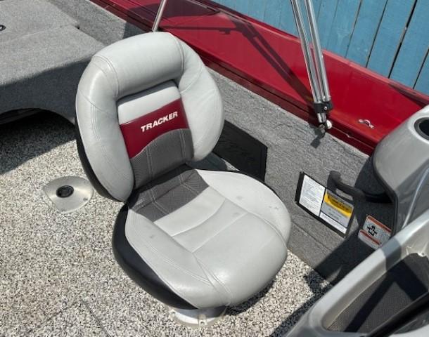 2015 Tracker Targa V-18 Combo boat seat with gray and red upholstery.