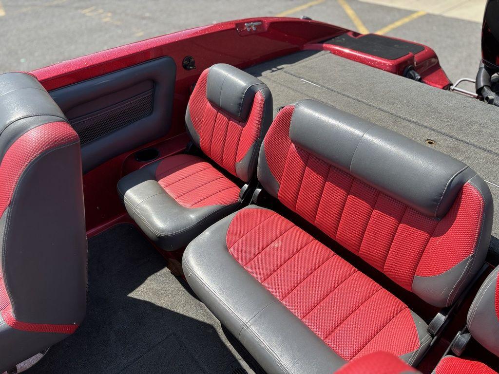 Red and gray interior seating of 2013 Stratos 486 SF boat.