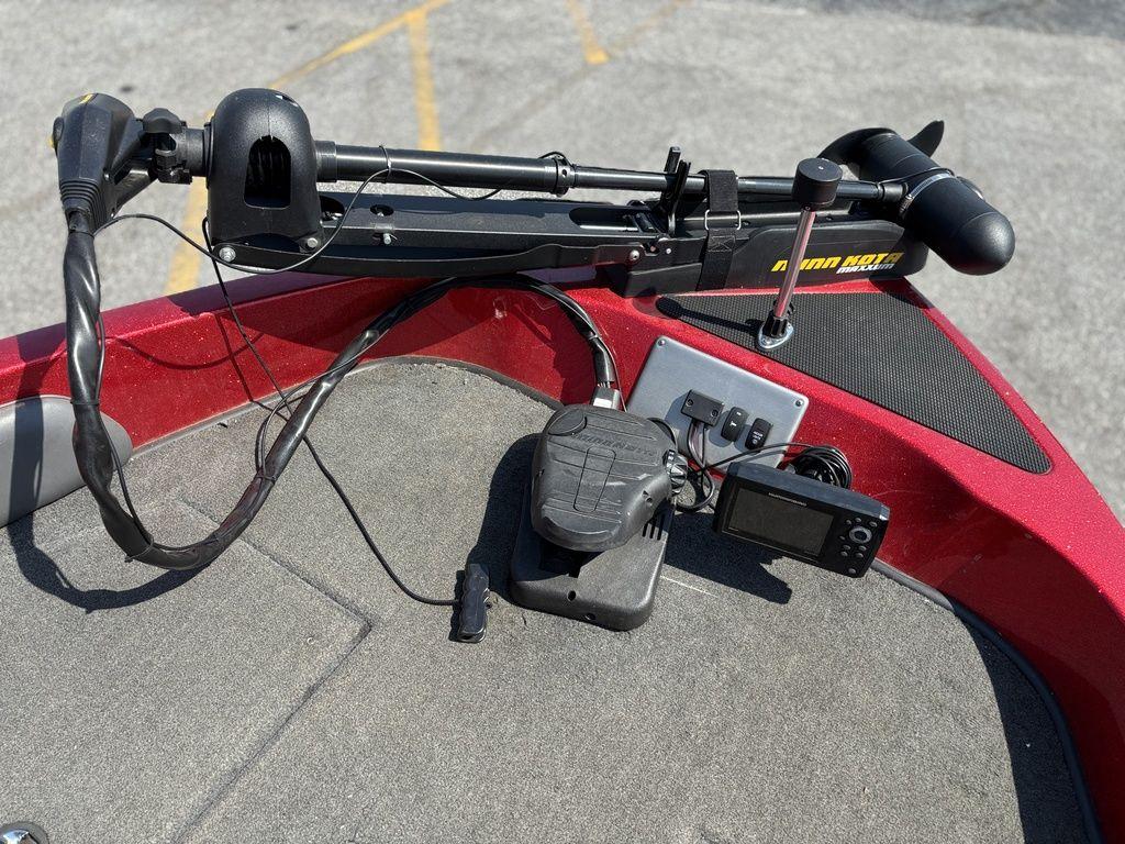 Red Stratos 486 SF boat deck with trolling motor and fish finder, 2013 model.