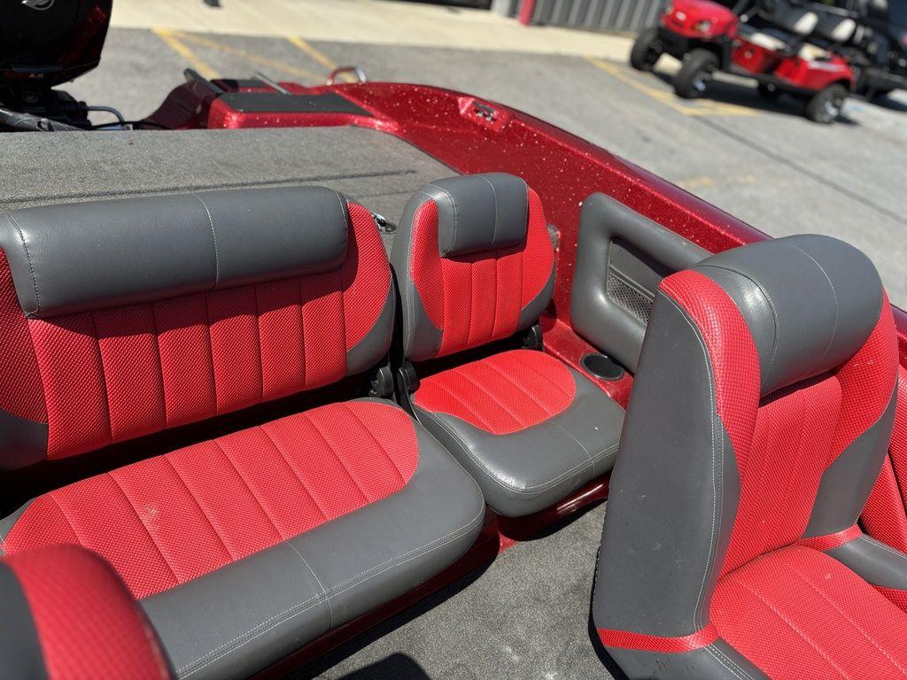 Red and gray interior seating of a 2013 Stratos 486 SF boat.