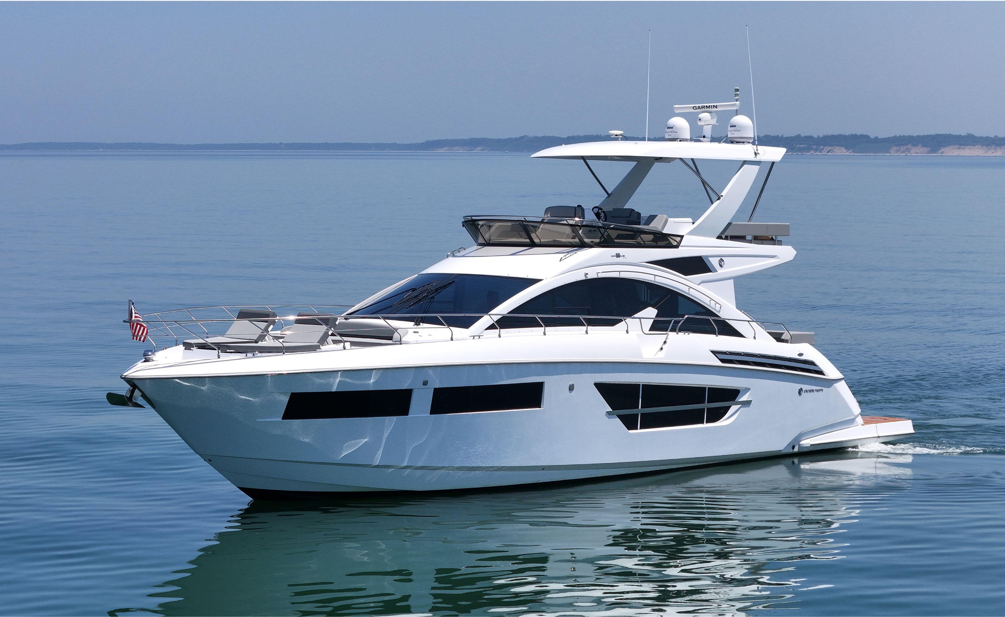 Cruisers Yachts-60 Fly 2022-RADIANT NY-US-2022 Cruisers Yachts 60 Fly luxury yacht cruising on calm blue waters.-9652120 | Thumbnail