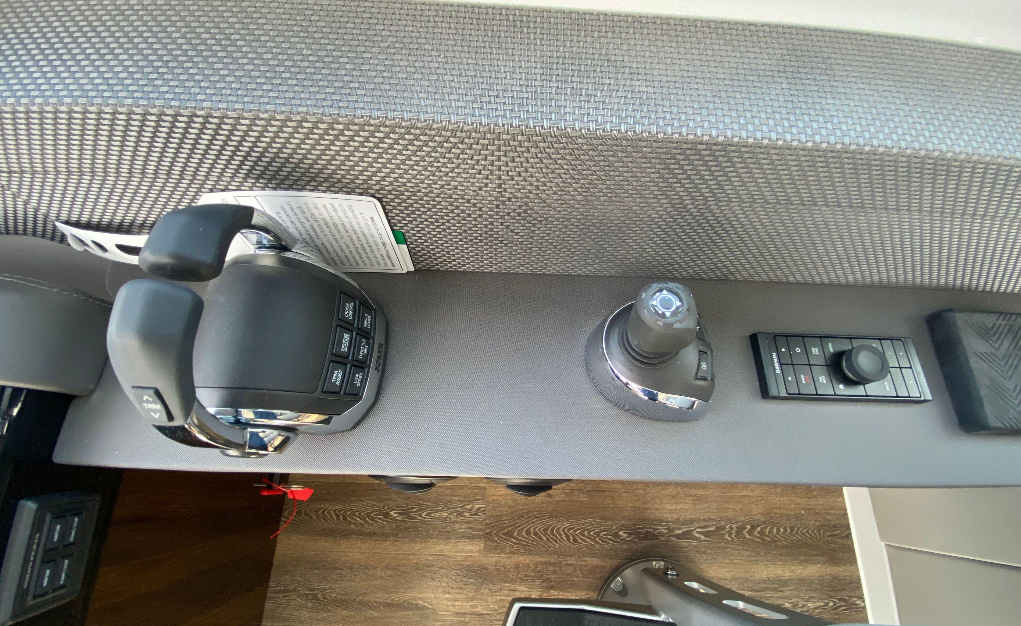 Cruisers Yachts-60 Fly 2022-RADIANT NY-US-Control panel of 2022 Cruisers Yachts 60 Fly, featuring joystick and throttle controls.-9652120 | Thumbnail