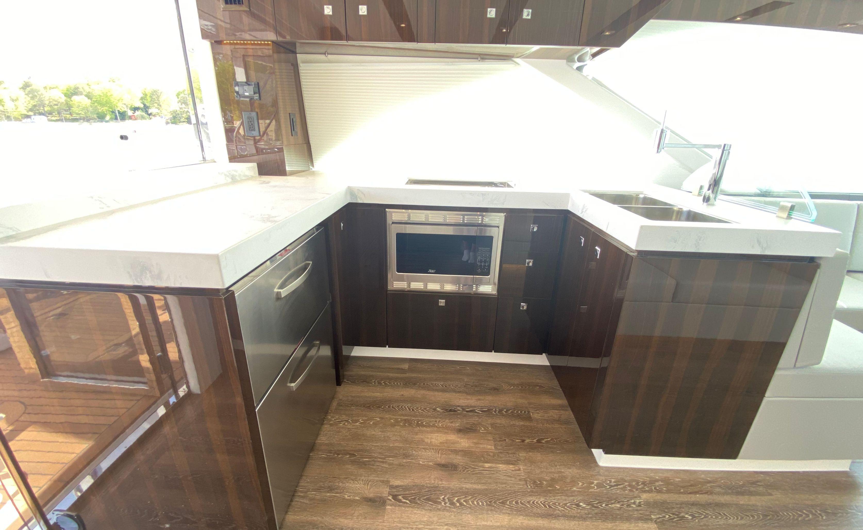 Cruisers Yachts-60 Fly 2022-RADIANT NY-US-Luxurious kitchen interior of 2022 Cruisers Yachts 60 Fly with modern appliances and sleek design.-9652120 | Thumbnail