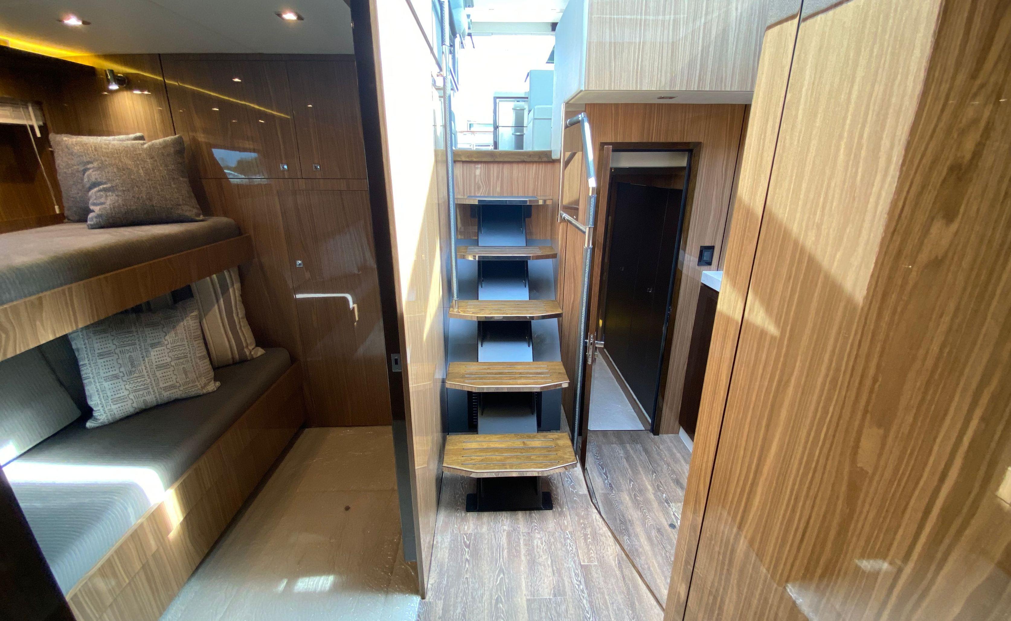 Cruisers Yachts-60 Fly 2022-RADIANT NY-US-Interior of 2022 Cruisers Yachts 60 Fly, featuring wooden finishes and bunk beds.-9652120 | Thumbnail