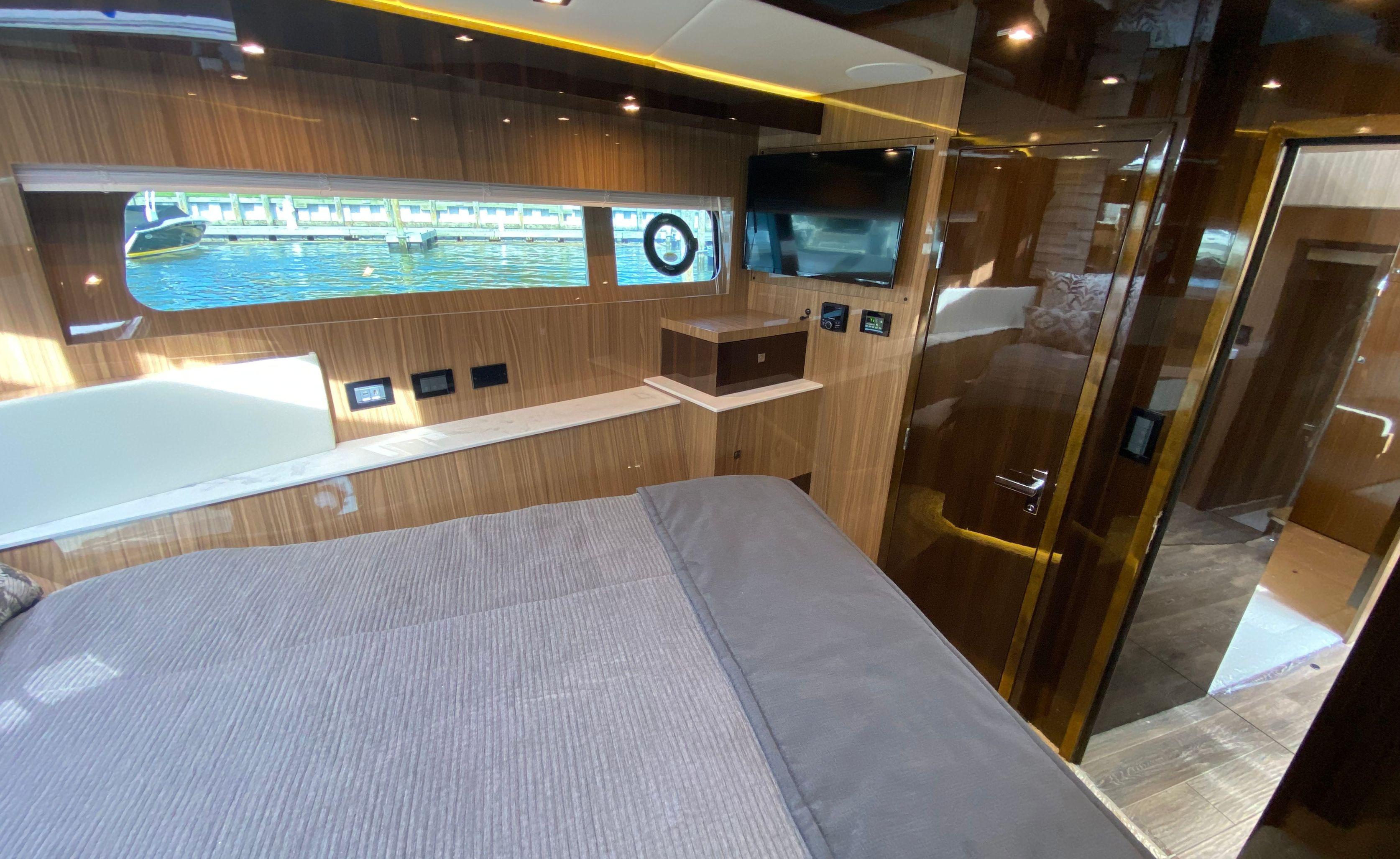 Cruisers Yachts-60 Fly 2022-RADIANT NY-US-Luxurious interior of 2022 Cruisers Yachts 60 Fly with wood paneling and water view.-9652120 | Thumbnail